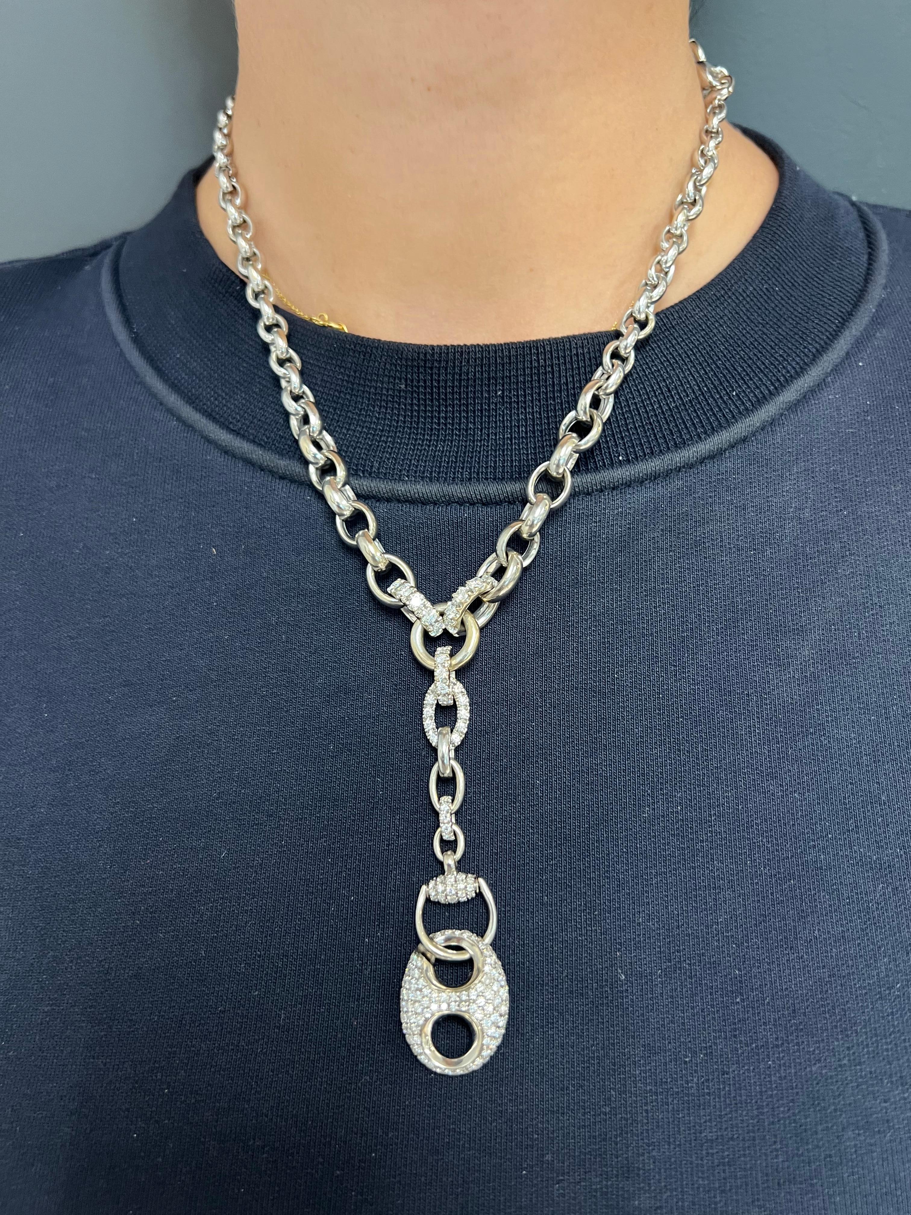 DESIGNER: Gucci
CIRCA: 1990’s
MATERIALS: 18k White Gold
GEMSTONE: 3.37 cts. Round Brilliant Diamond
WEIGHT: 50.1 grams
MEASUREMENTS: Necklace: 18” long, Pendant: 3” x 3/4”
HALLMARKS: 750, Gucci Made in Italy
ITEM DETAILS:
An 18k white gold and