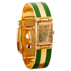 Gucci Montre-bracelet vintage à boucle ceinture en or jaune 18 carats et émail vert