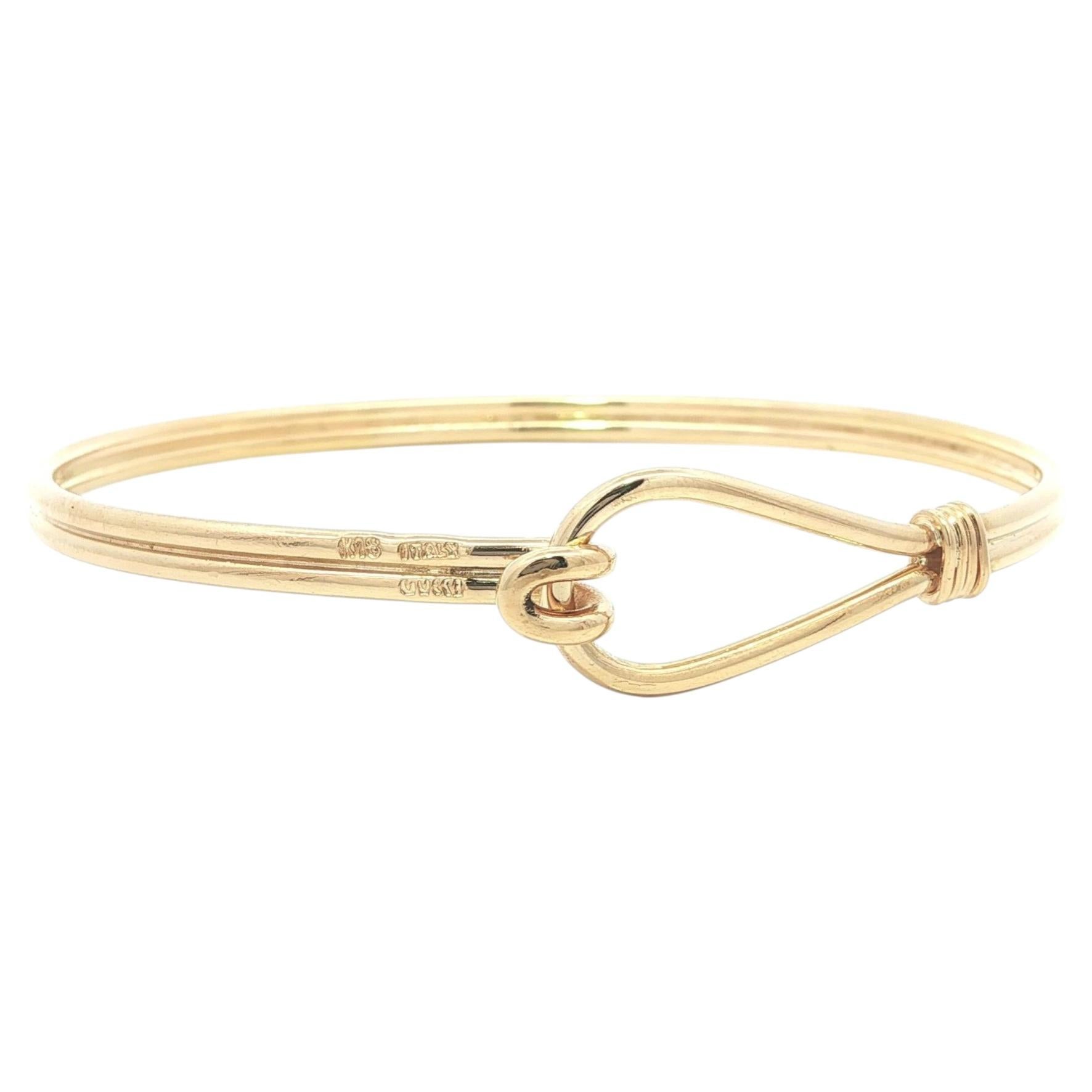 Pulsera brazalete estribo nudo gancho oro amarillo 18k vintage Gucci