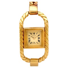Vintage Gucci 18k yellow gold twist buckle watch