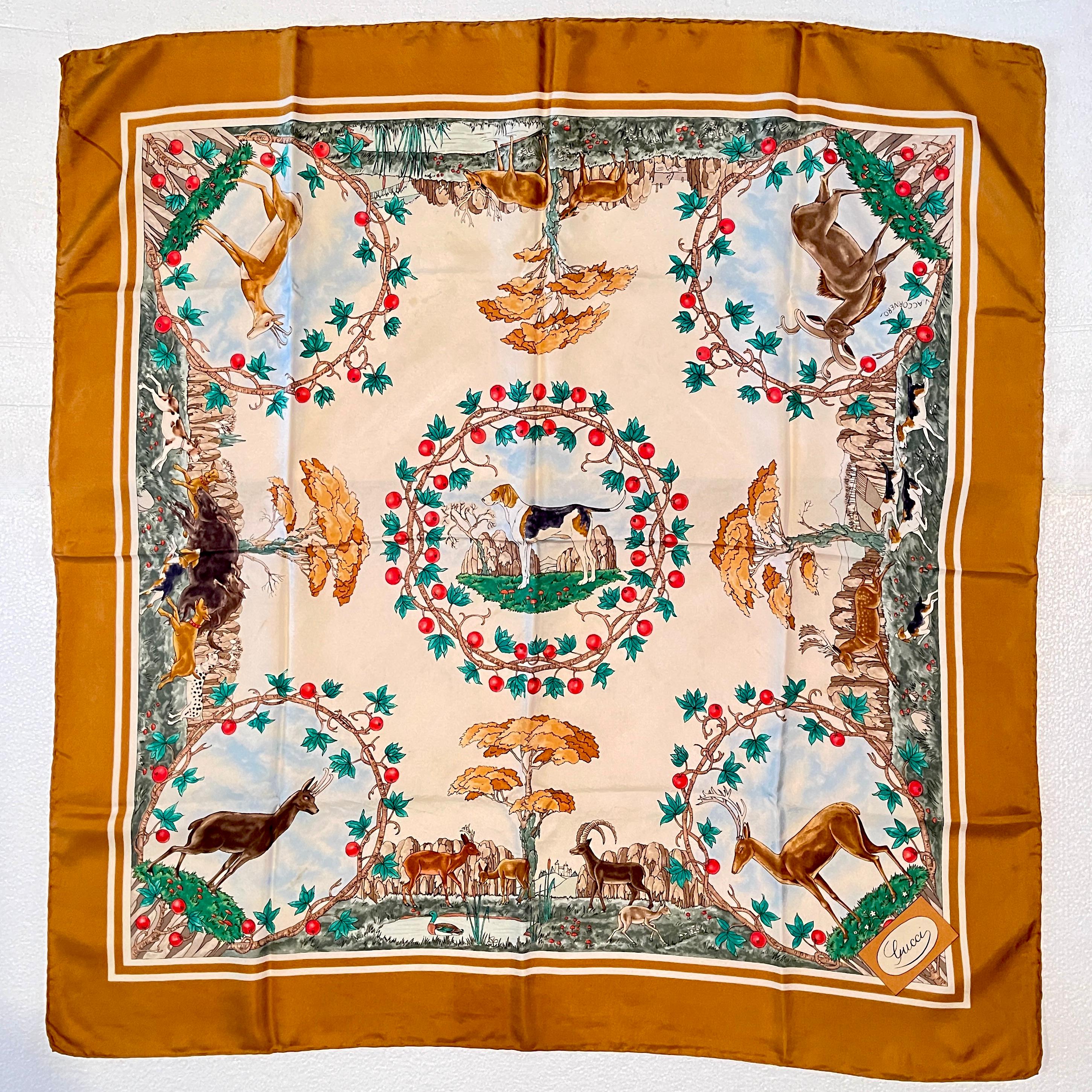 From the Italian fashion house Gucci, and designed by Vittorio Accornero, a vintage silk scarf with a hunting dog theme, circa 1970s.

Boldly colored and beautifully detailed, a central motif of a beagle or pointer dog standing in a landscape