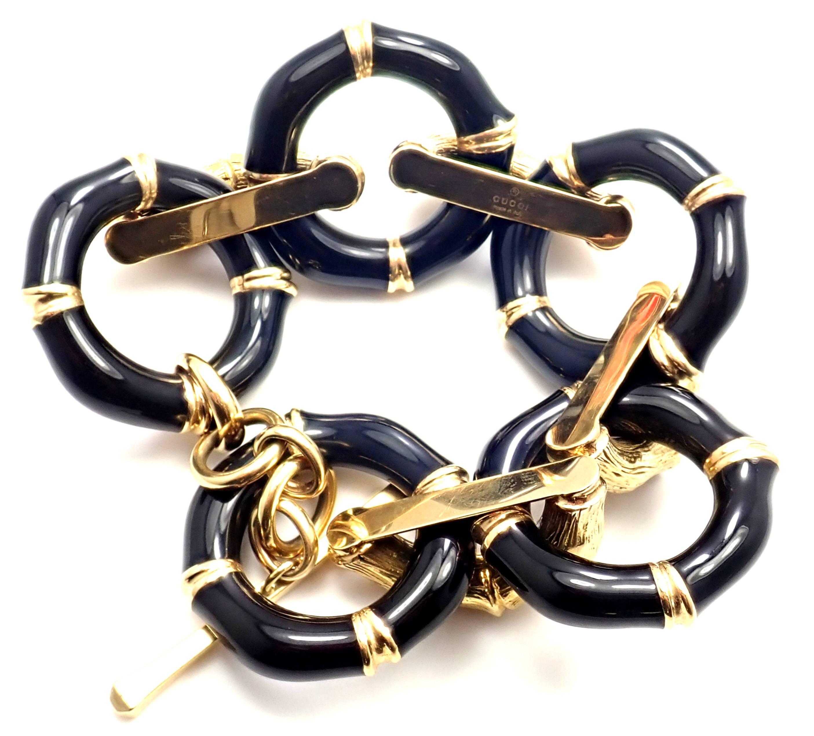 18k Yellow Gold Black Enamel Vintage Bamboo Large Link Bracelet by Gucci.
Details:
Length: 8