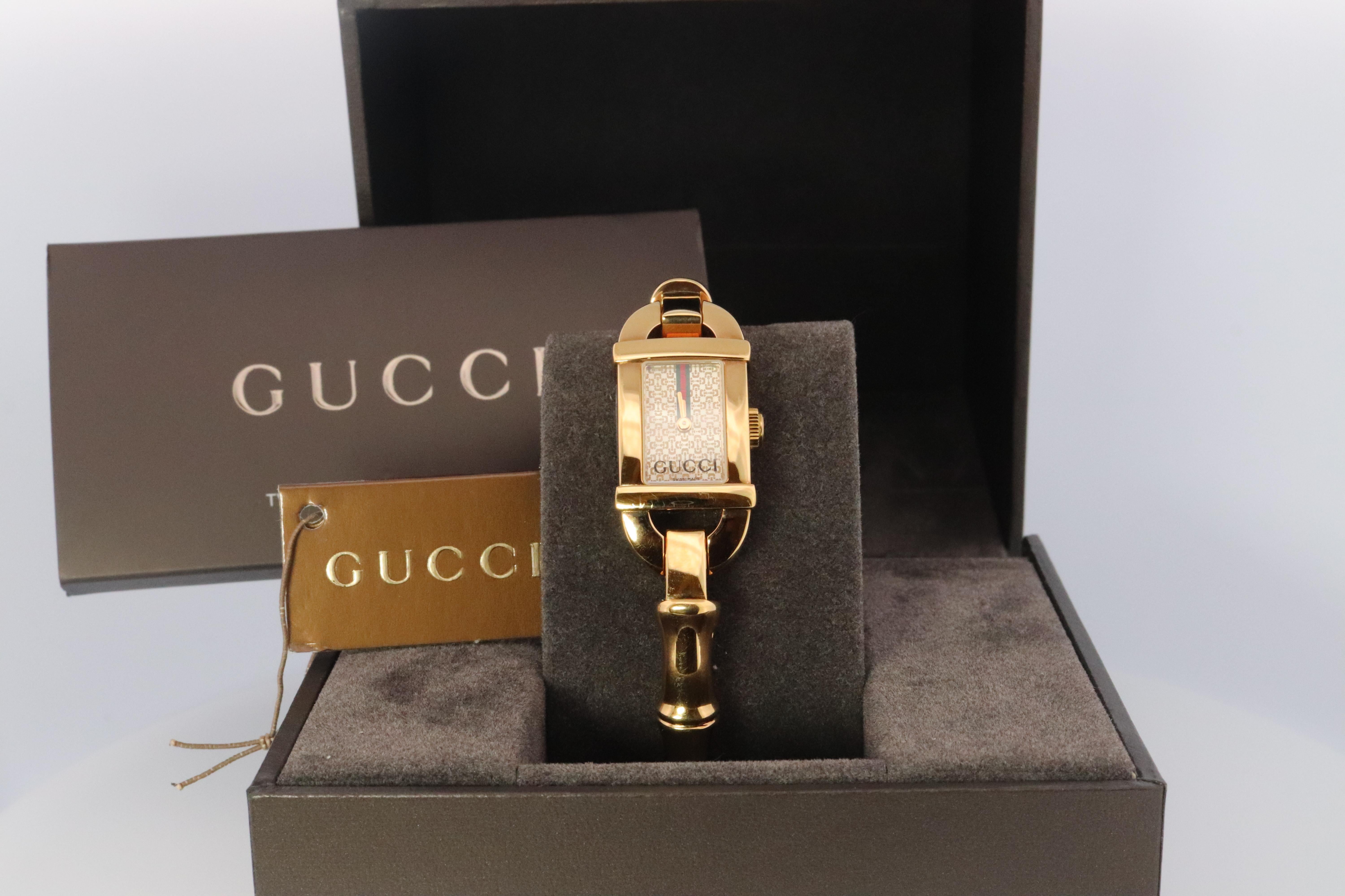 Genuine Gucci Watch.
Original Case, Box, and Original Paperwork as it came from Gucci.

6800L Reference number.

Gold Tone 

Bamboo Bangle

Condition: New battery.
