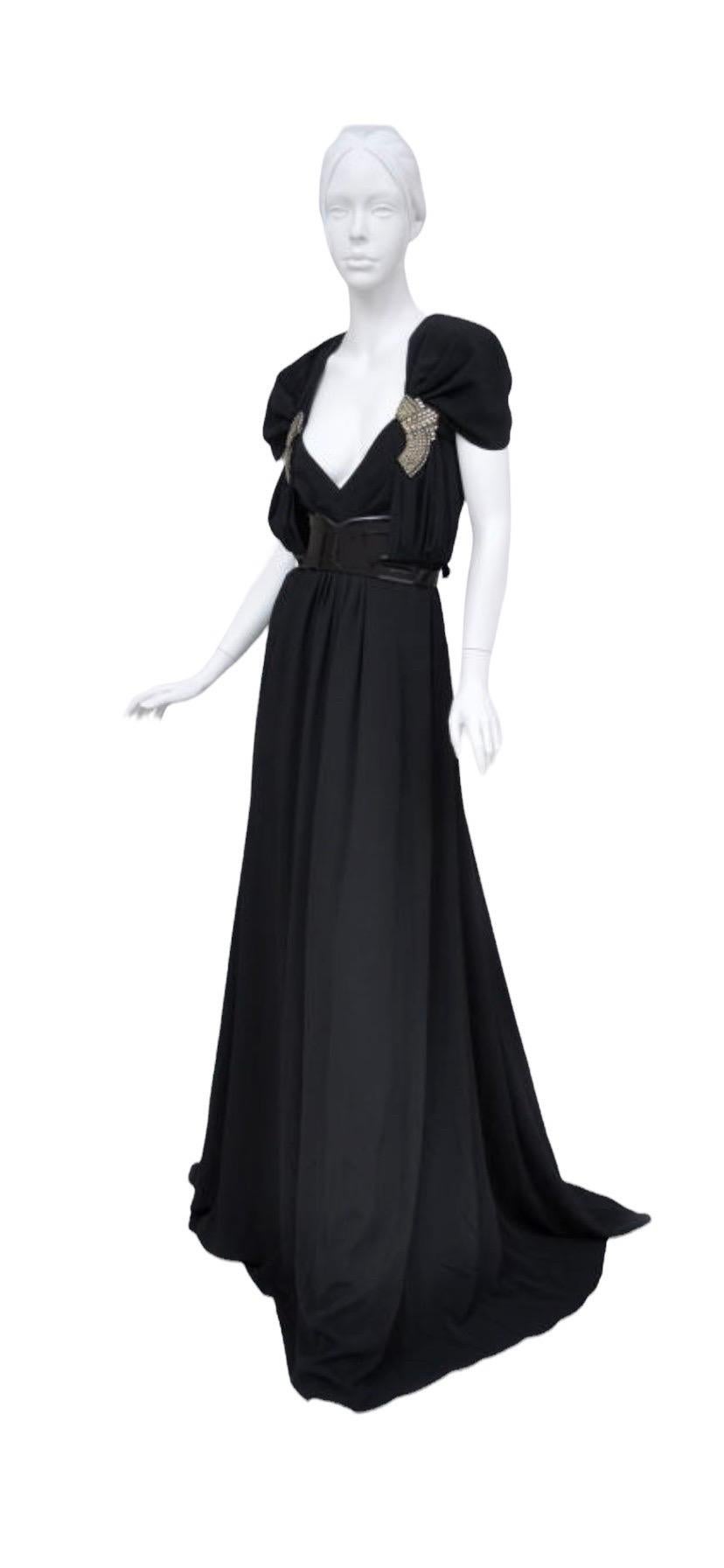 Gucci's Black Gown Dazzles with Classic Hollywood Glamour.
Italian size 42 ( US 6)
Embroidery with Crystals and Chains, Black Patent Leather Belt, Fully Lined, Discreet Back Zipper.
Measurements: Length 66 inches, Bust 36