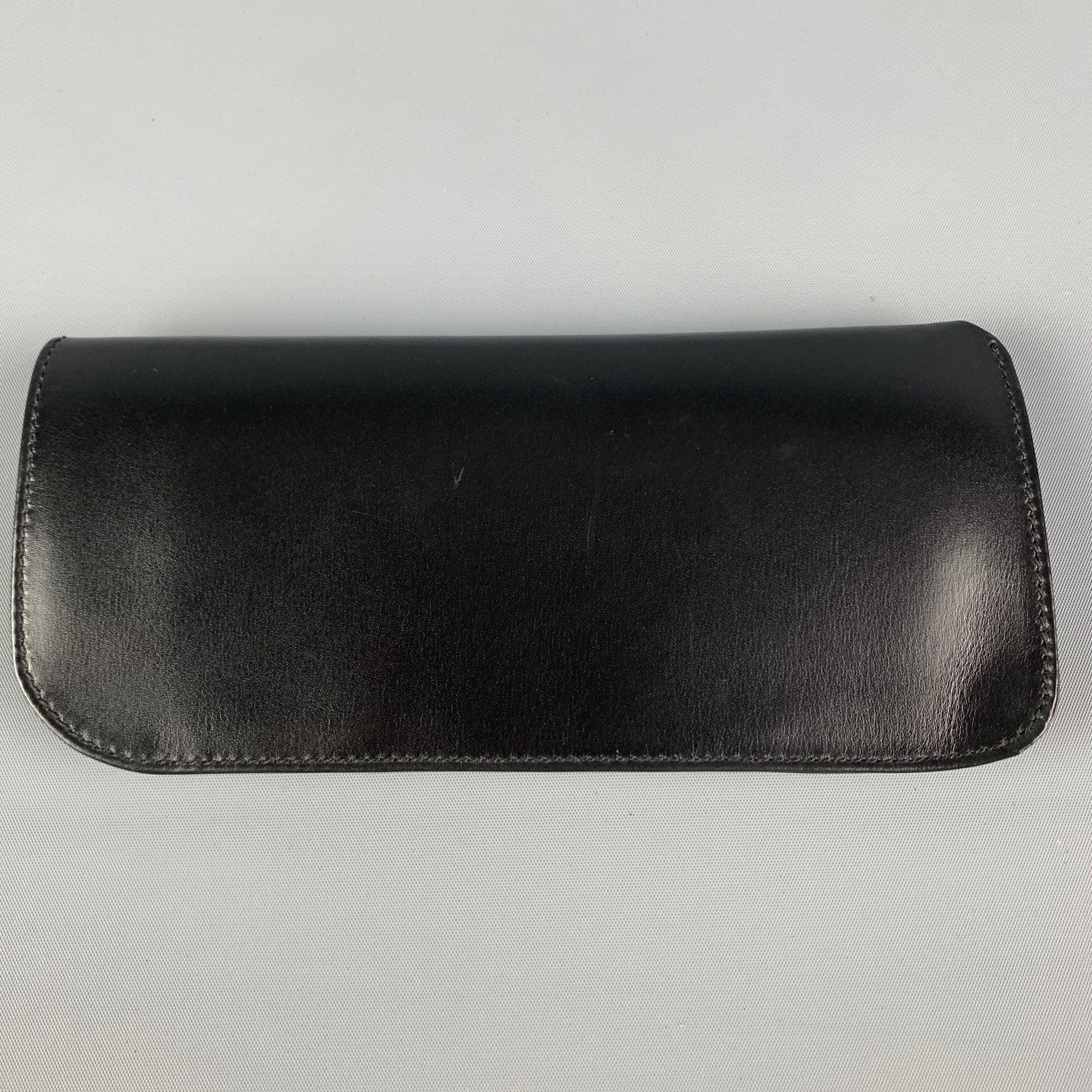 Vintage GUCCI sunglasses case comes in a black leather featuring a gold tone logo emblem. Includes box. Made in Italy.
 Very Good
 Pre-Owned Condition. 
 

 Marked: 
 

 Measurements: 
  Height: 3.25 inches Length: 7 inches 
  
  
  
 Sui Generis