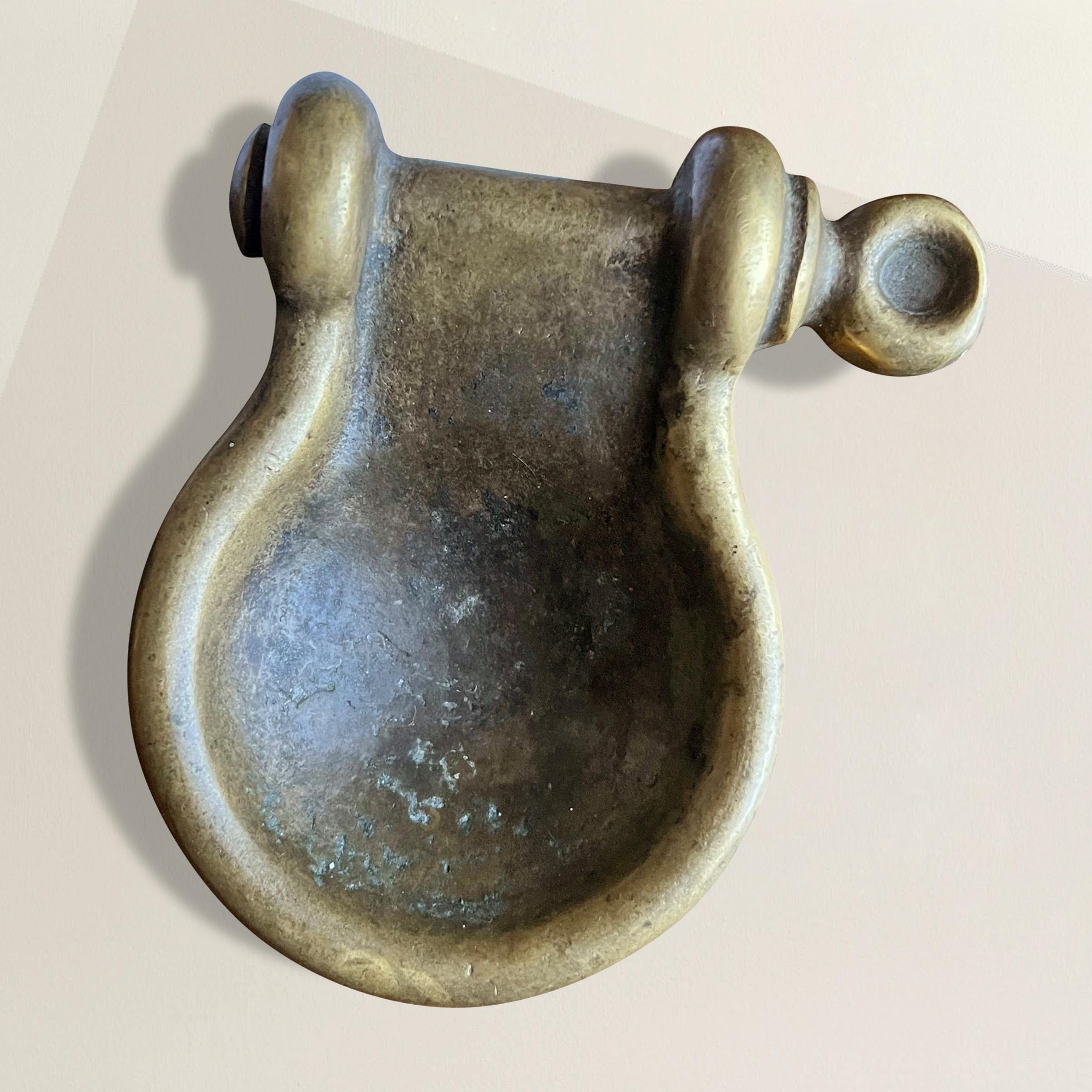 A chic Mid-20th Century Italian bronze horsebit catchall by Gucci. Purchased in Florence, Italy from a vintage fashion dealer who said this was borrowed by the Gucci Museo for an exhibition showcasing the company's housewares.