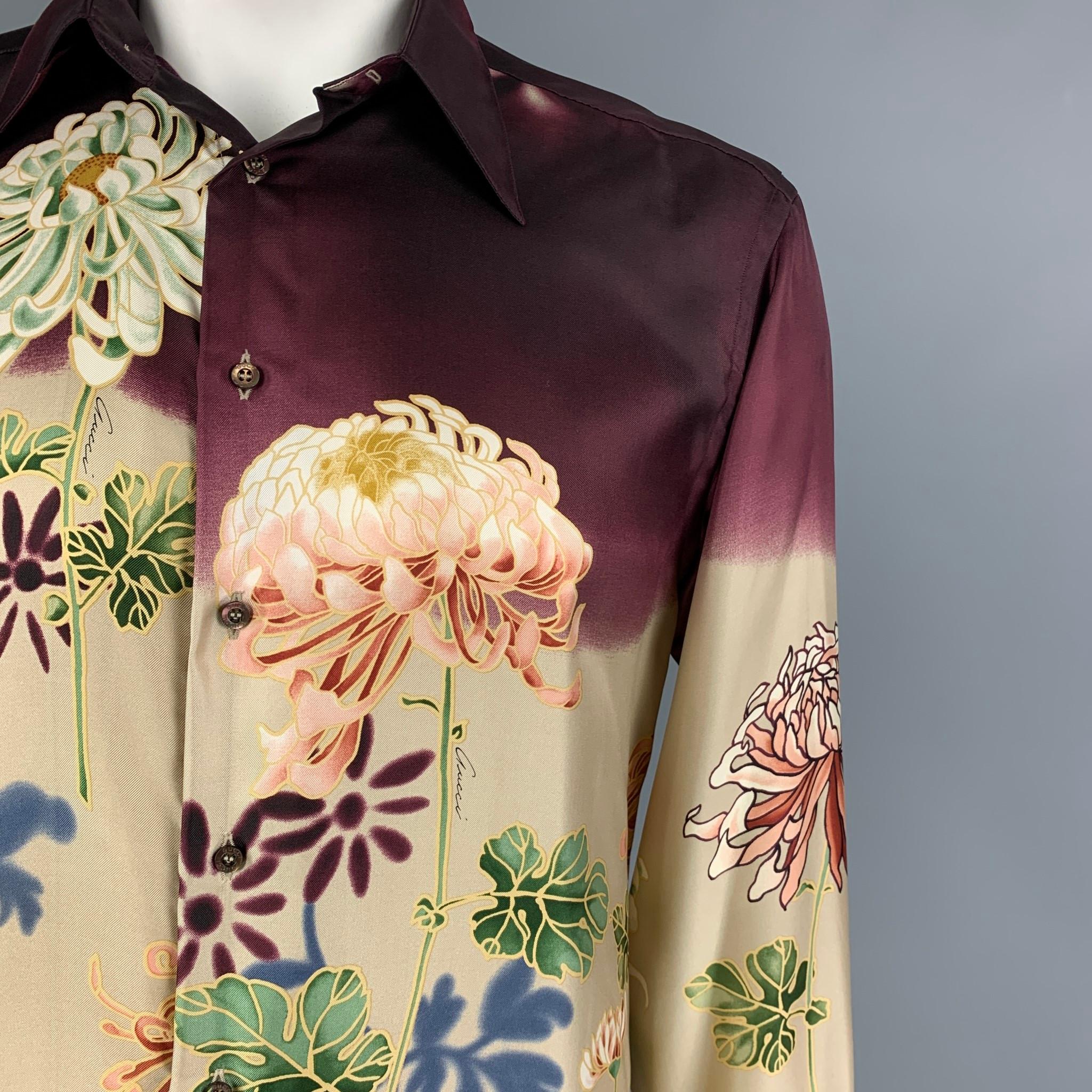 Vintage GUCCI by Tom Ford 2003 long sleeve shirt comes in a beige chrysanthemum floral print silk featuring a spread collar and a button up closure. Made in Italy.

Very Good Pre-Owned Condition.
Marked: 40-15 3/4

Measurements:

Shoulder: 20