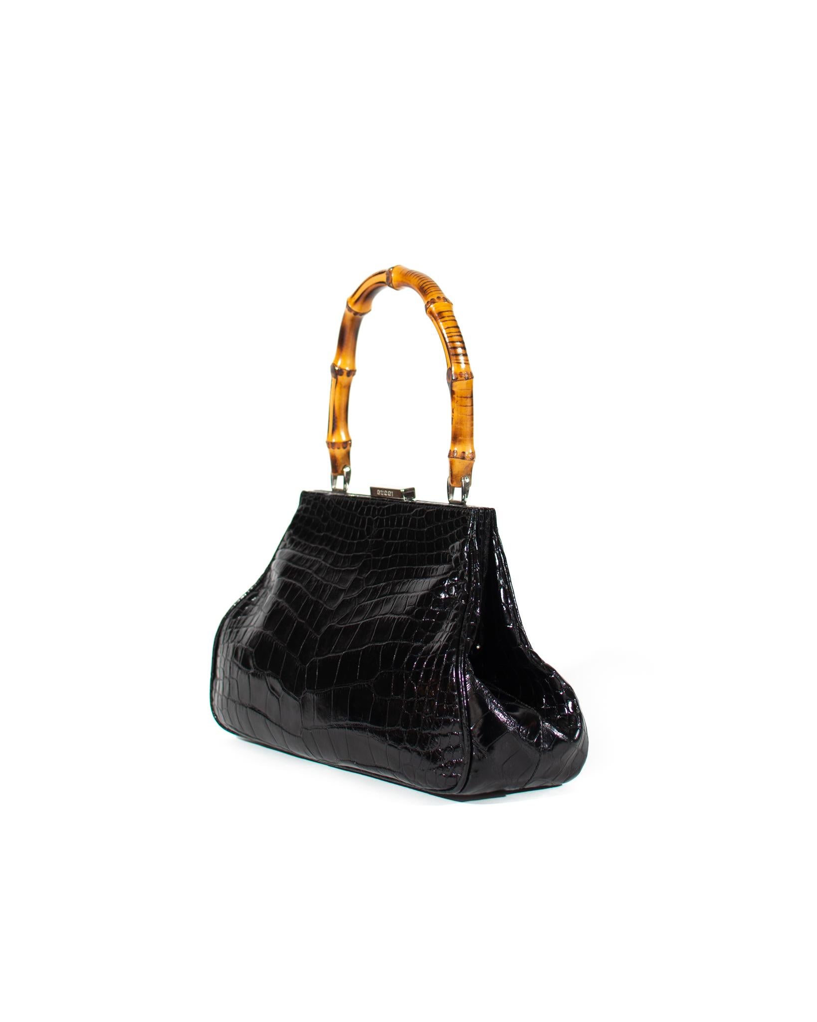 Presenting No one knows how to sell sexy better than designer Tom Ford. This bag embodies his dedication to elevating classic designs and adding his thoughtful and sleek touches. This bag boasts a stunning black alligator leather body with a silver