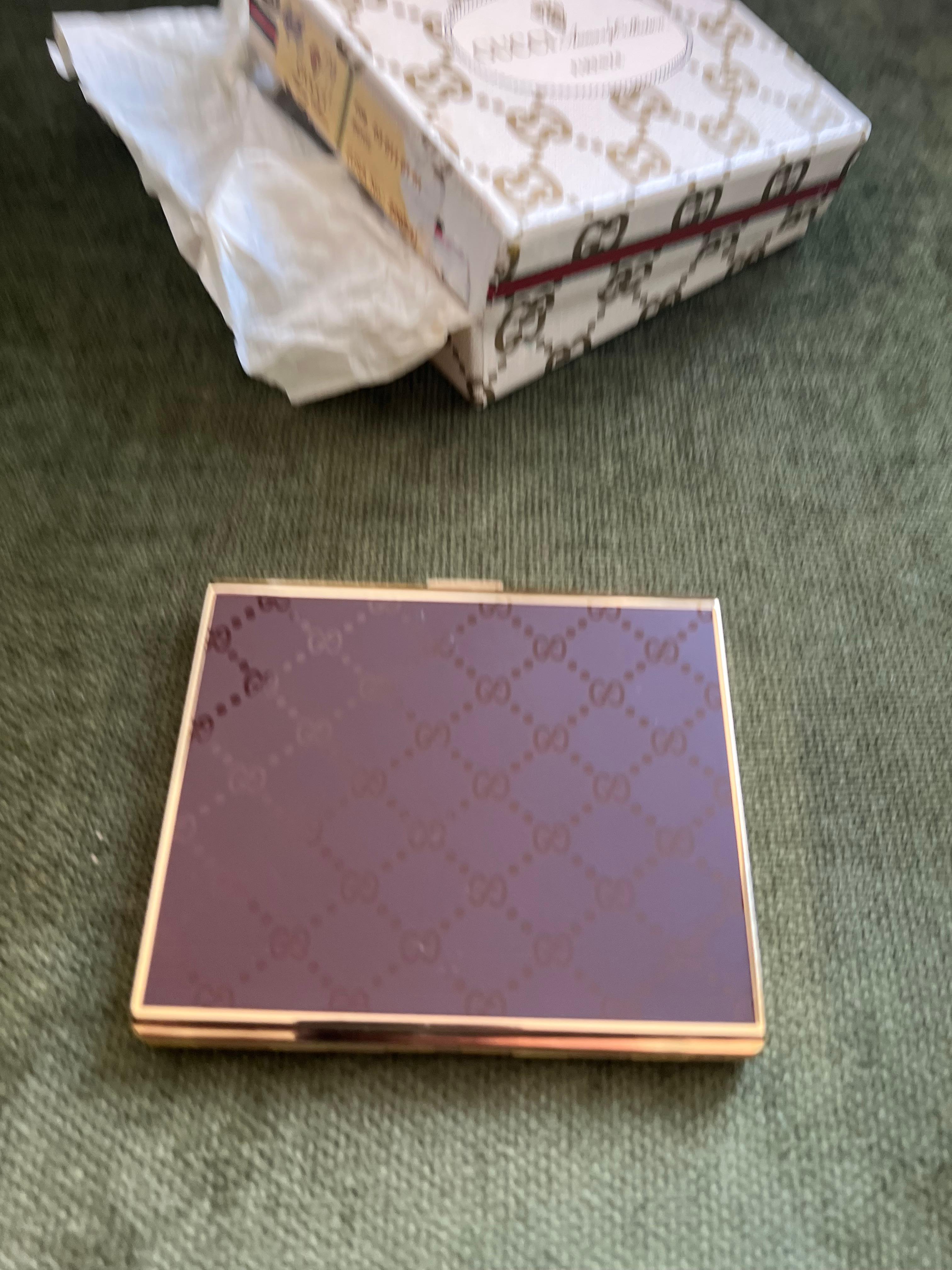 Vintage “Gucci” Chic Retro Cigarette Case, Circa 1980s Original Gucci Box Case

Vintage Retro Cigarette Case, Circa 1980s Original Case
GUCCi retro cigarette case 
Logo Cigarette Case Gold & Chocolate Color 
The case is in mint condition. Was never