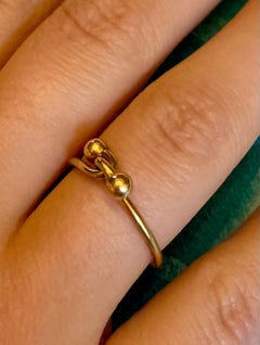 Anello vintage Gucci con doppio gancio in oro giallo 18 carati