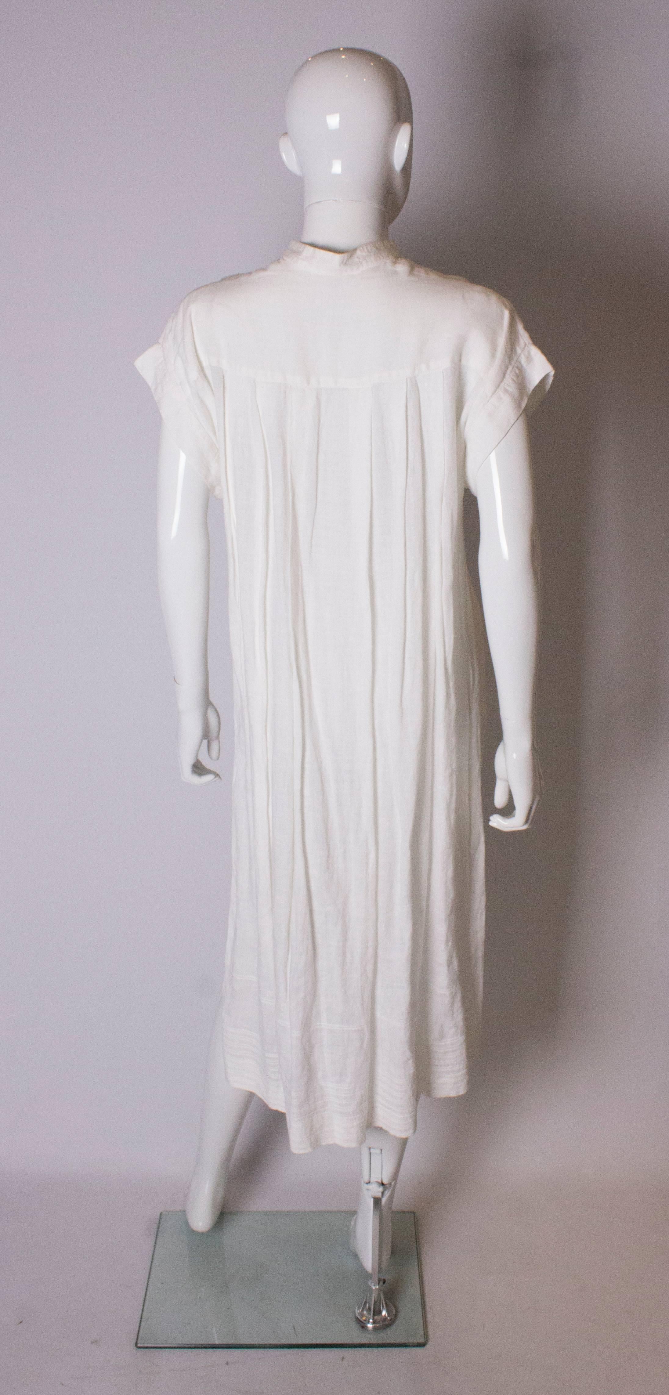 A Vintage 1980s white linen button front day summer dress by Gucci  2