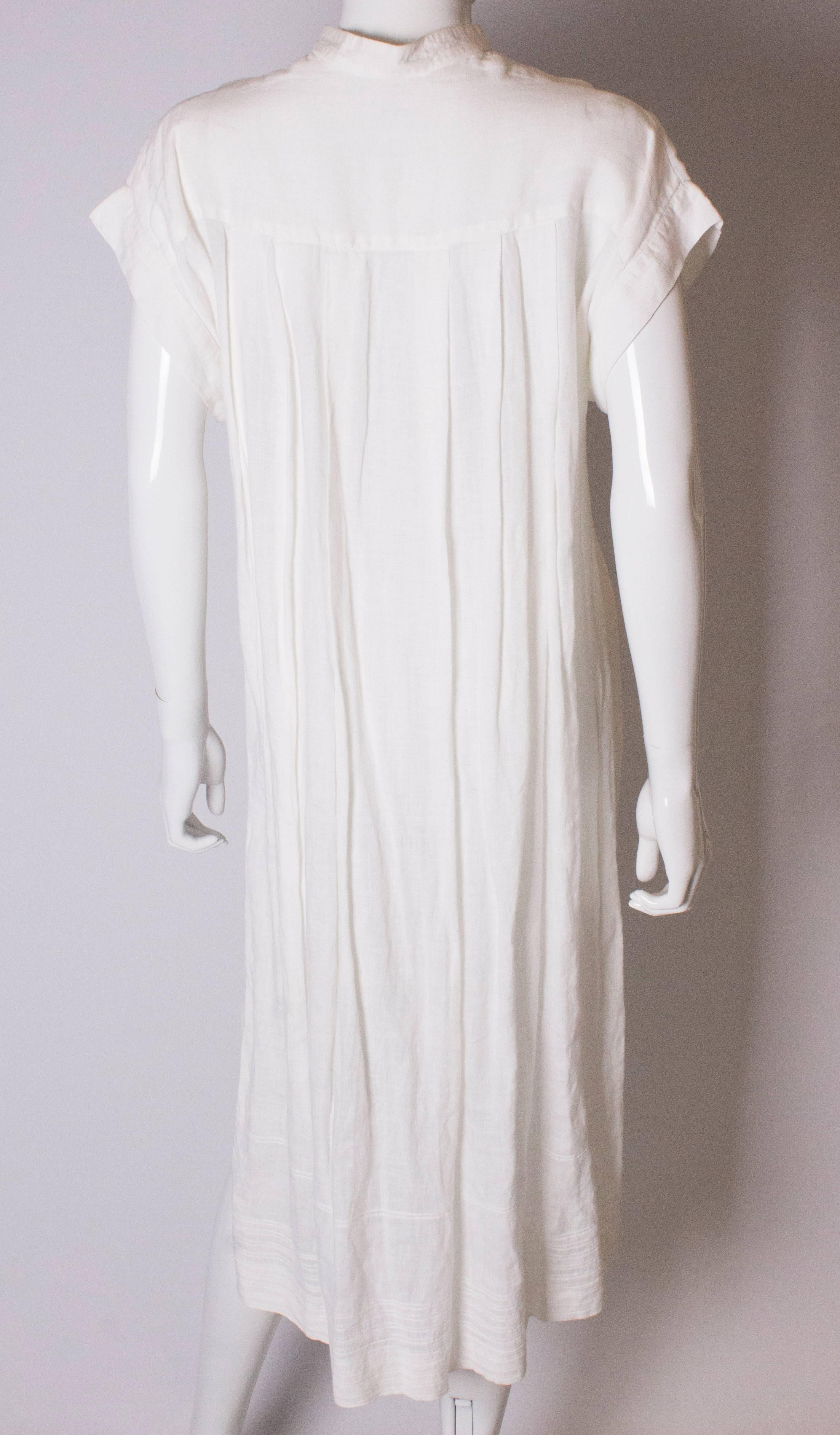 A Vintage 1980s white linen button front day summer dress by Gucci  3