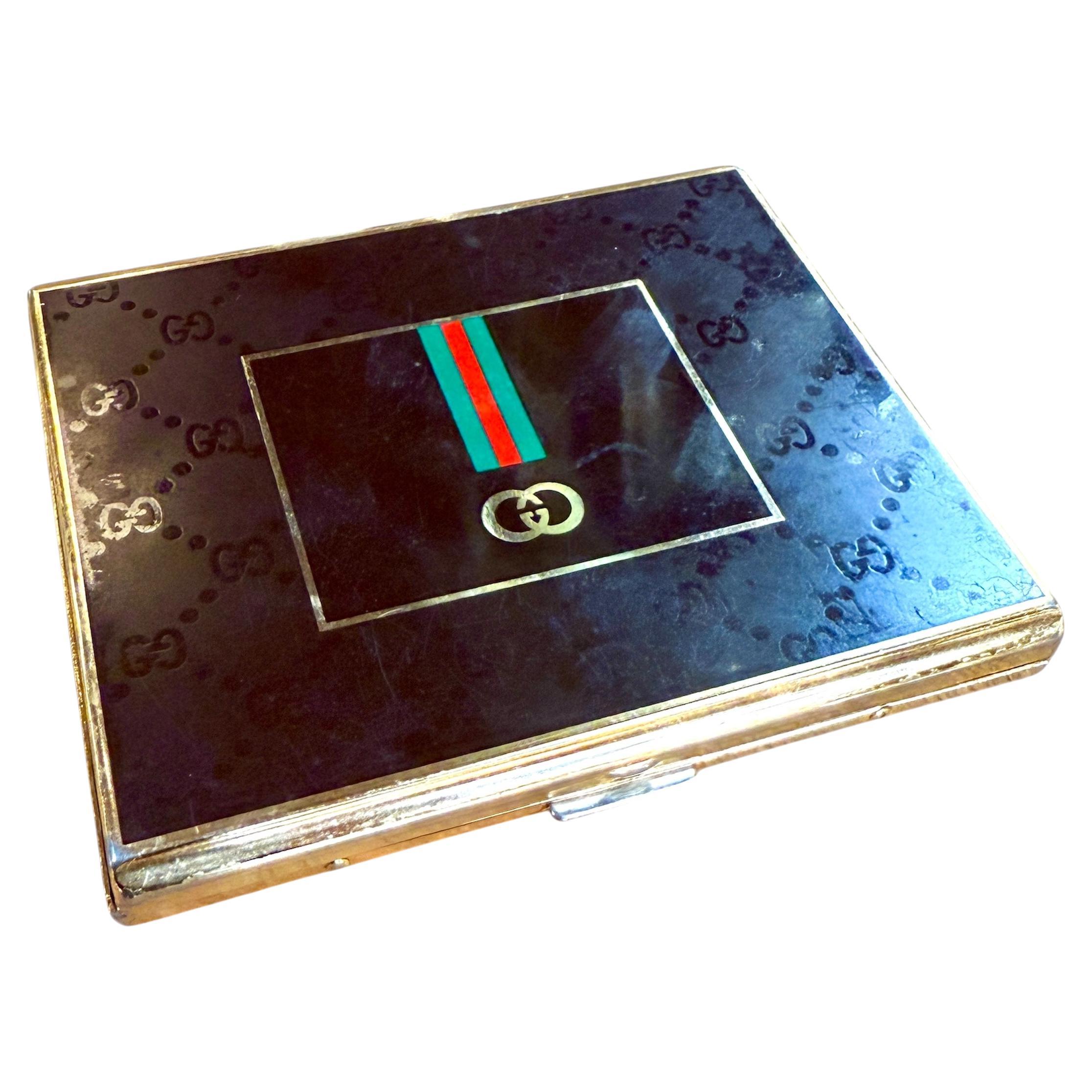 Vintage By Gucci: portasigarette e portacarte in smalto e dorato