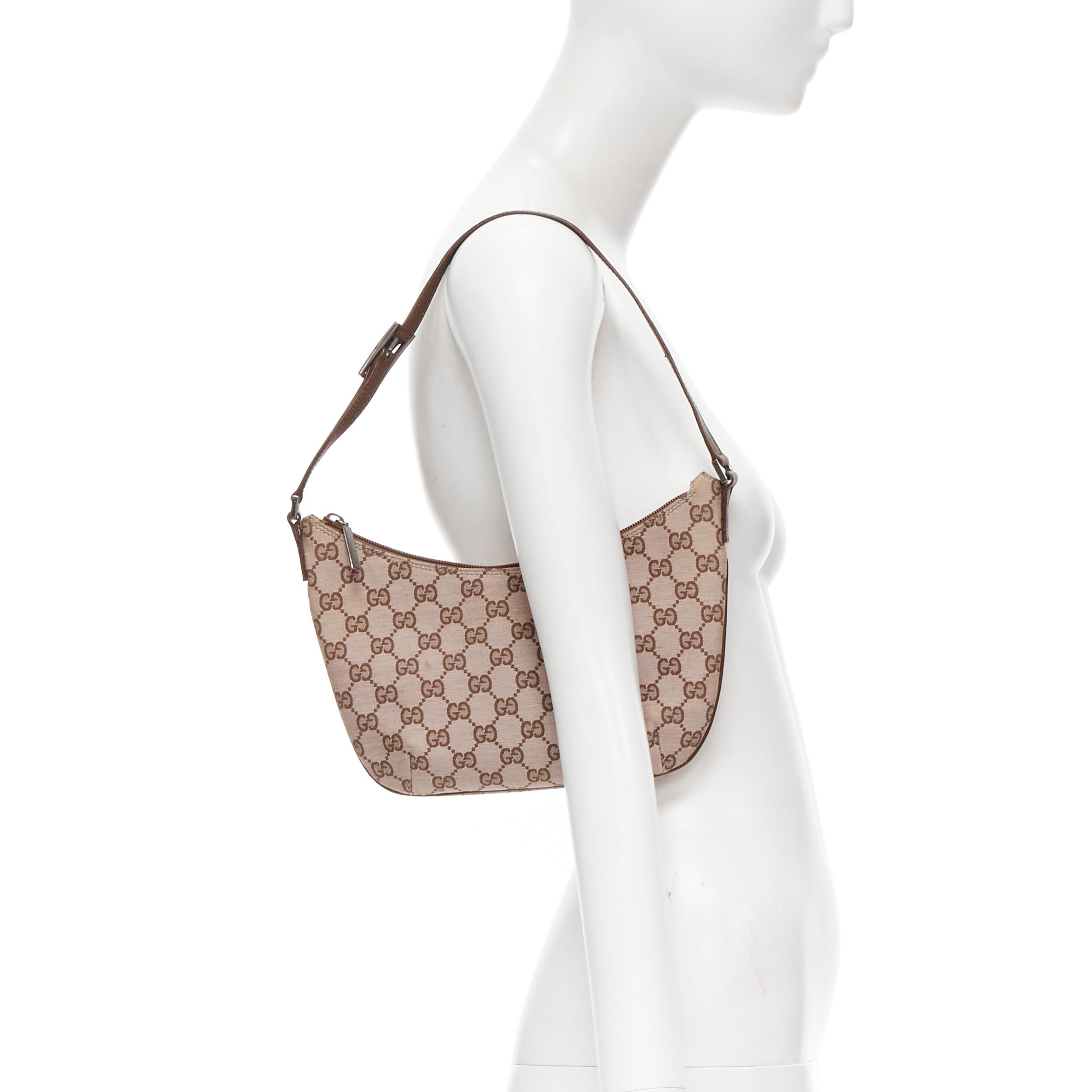 vintage GUCCI GG Monogram canvas brown leather strap underarm shoulder bag 

Reference: CELG/A00004 
Brand: Gucci 
Material: Cotton 
Color: Brown 
Pattern: Solid 
Closure: Zip 
Extra Detail: 0050813. Brown monogram canvas upper. Brown leather