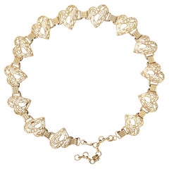 Vintage Gucci gold-colored metal belt