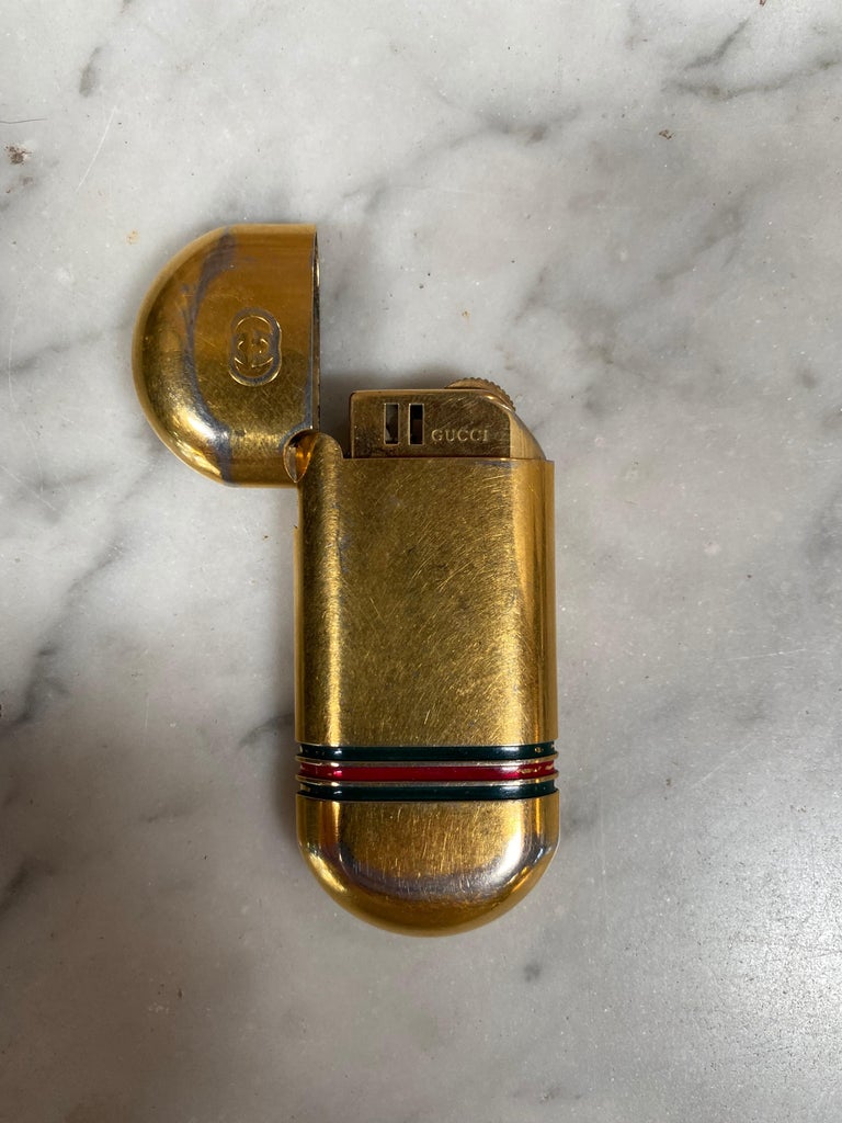 Vintage Gucci Gold Lighter, 1970s at 1stDibs | vintage gucci lighter, gucci  ammo
