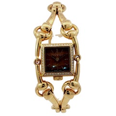 Vintage Gucci Horsebit 'Signoria' Diamond Bezel Tigers Eye 18K Gold Watch 1980