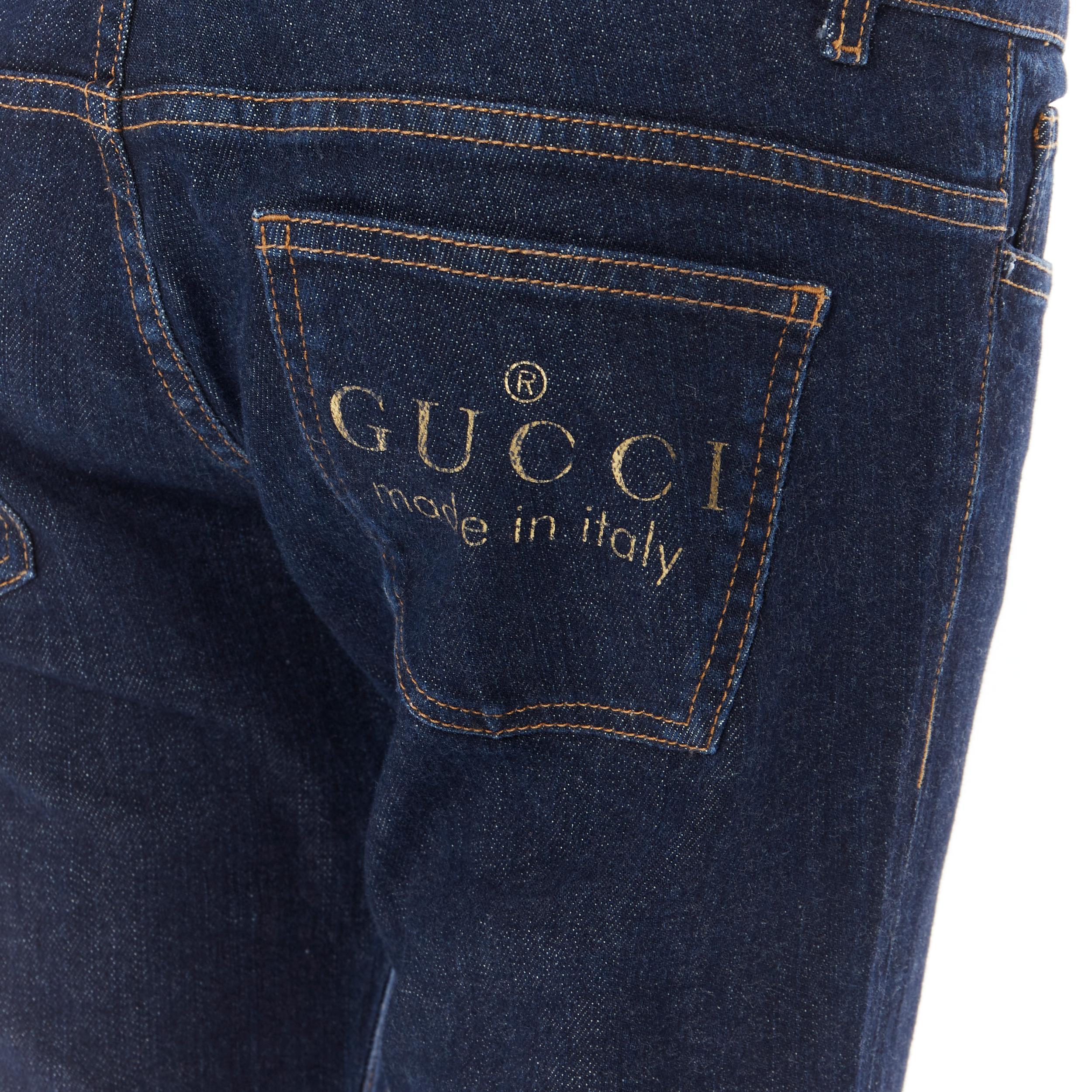 vintage GUCCI indigo blue denim gold logo print flared low rise jeans IT44 
Reference: GIYG/A00030 
Brand: Gucci 
Material: Denim 
Color: Blue 
Pattern: Solid 
Closure: Zip 
Extra Detail: Printed GUCCI logo on back pocket. 5-pocket design. 
Made in: