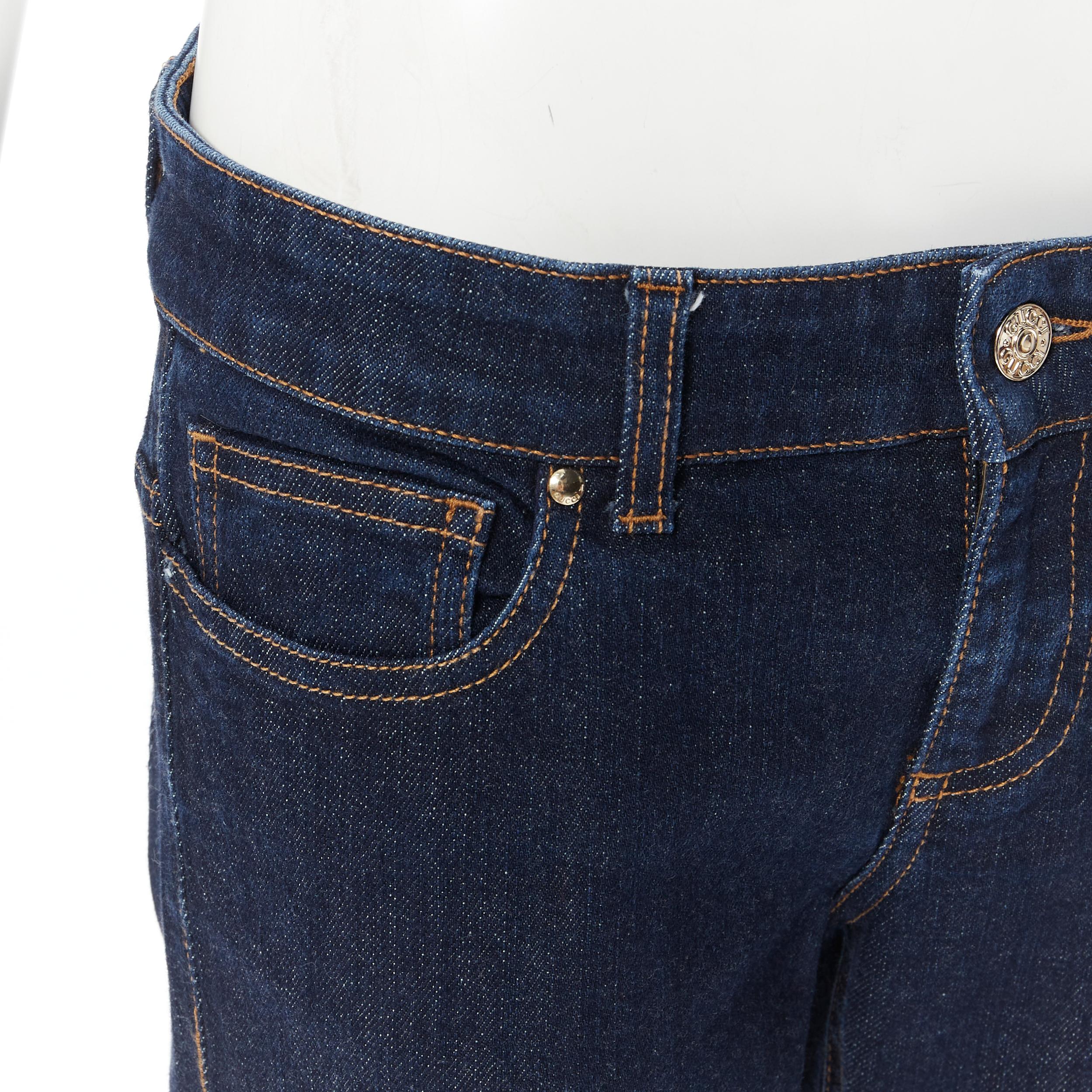 Women's vintage GUCCI indigo blue denim gold logo print flared low rise jeans IT44