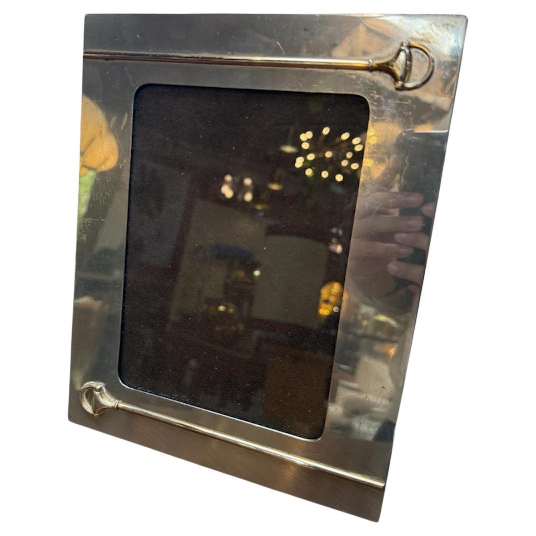 Portafoto d
epoca in ottone di Gucci Italia con punta da equitazione