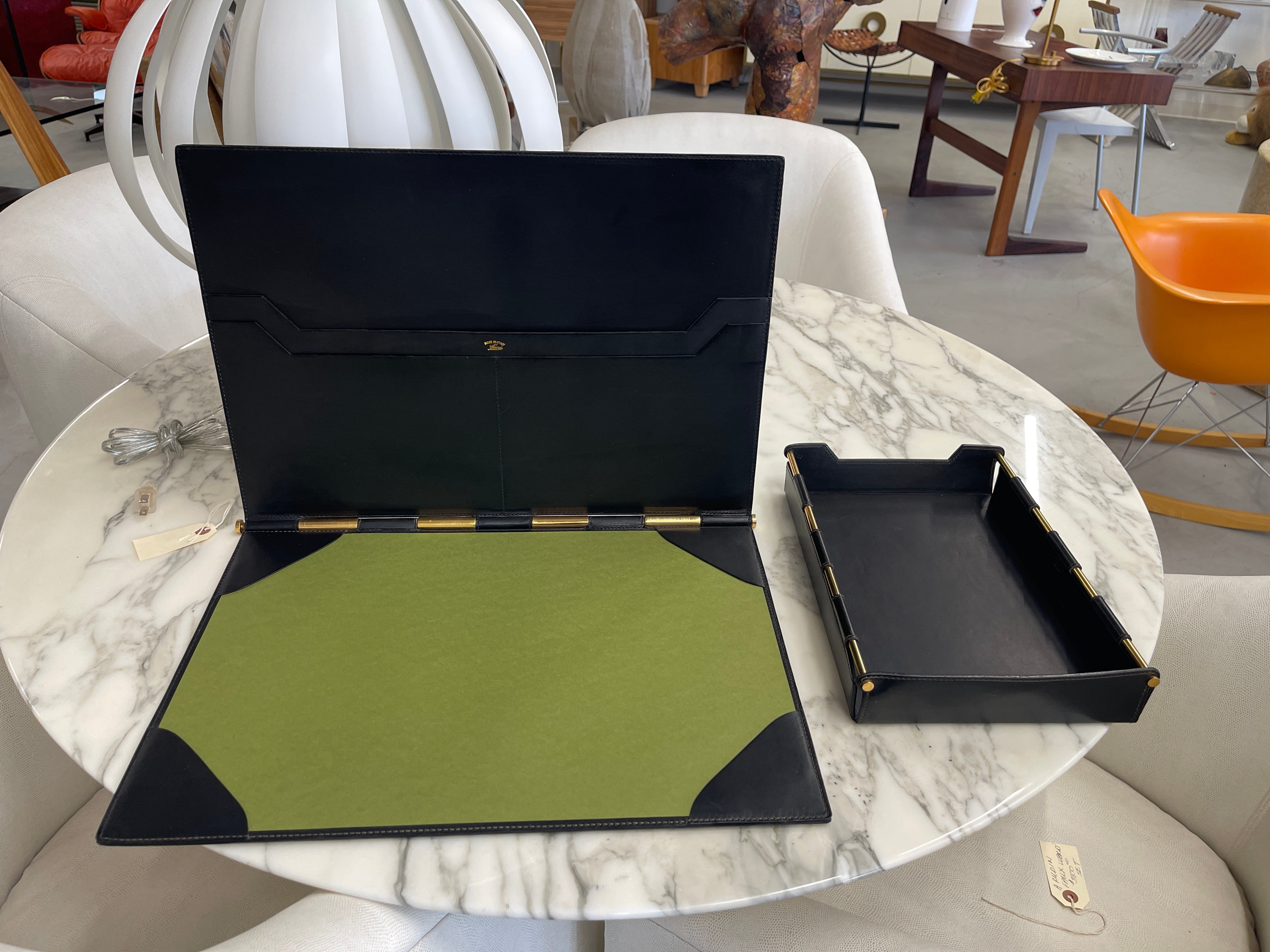 Beautiful Gucci desk set from the 1970's out of a local Palm Springs estate. We've had the leather polished and a new paper blotter fitted. The set is pictured in a 1970 dated issue of architectural digest on a desk, picture attached. The desk pad