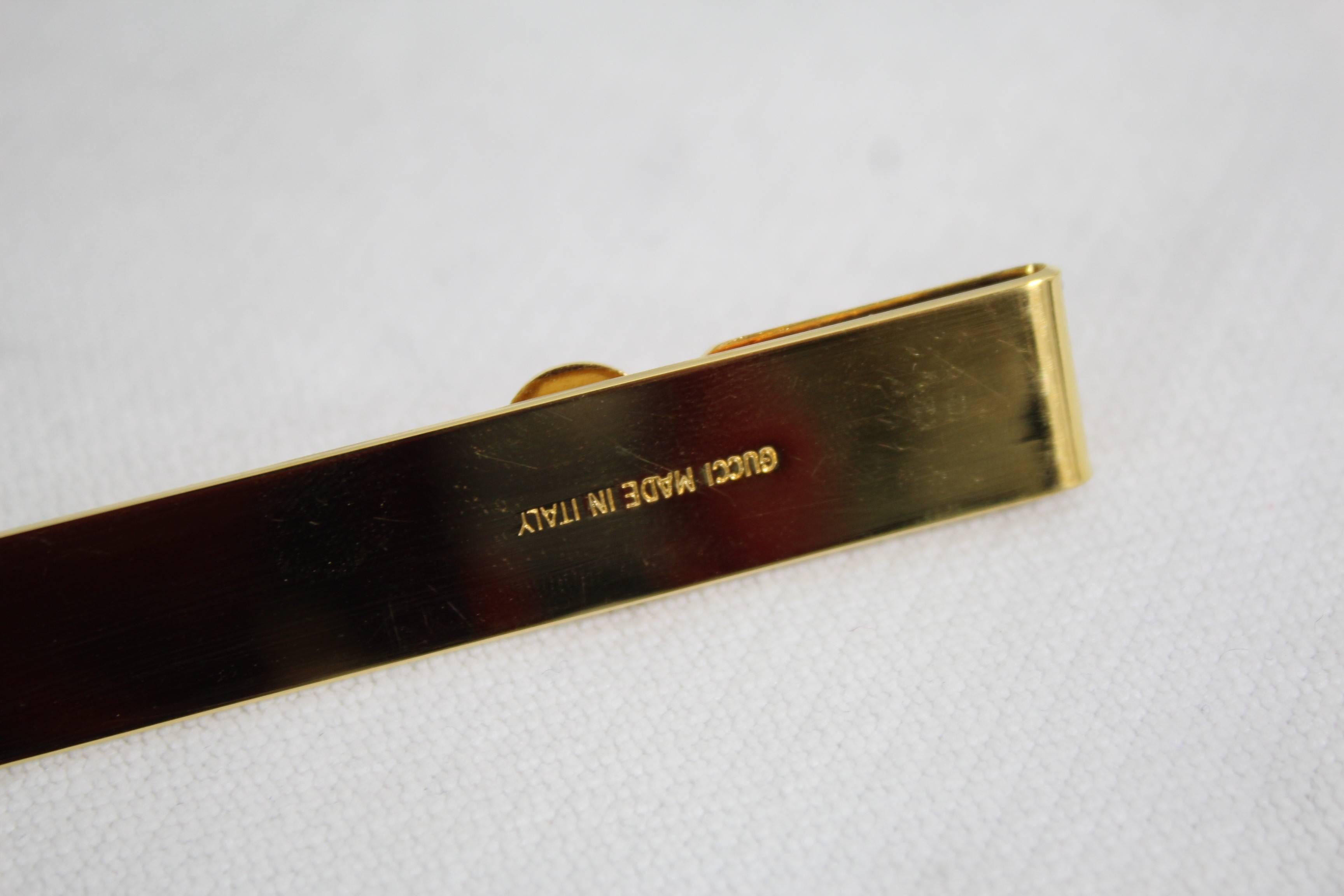 Vinatge Gold Plated Gucci Book mark / letter opener in excellent condition.

Coming with its lzard pouch.

Signed in the back