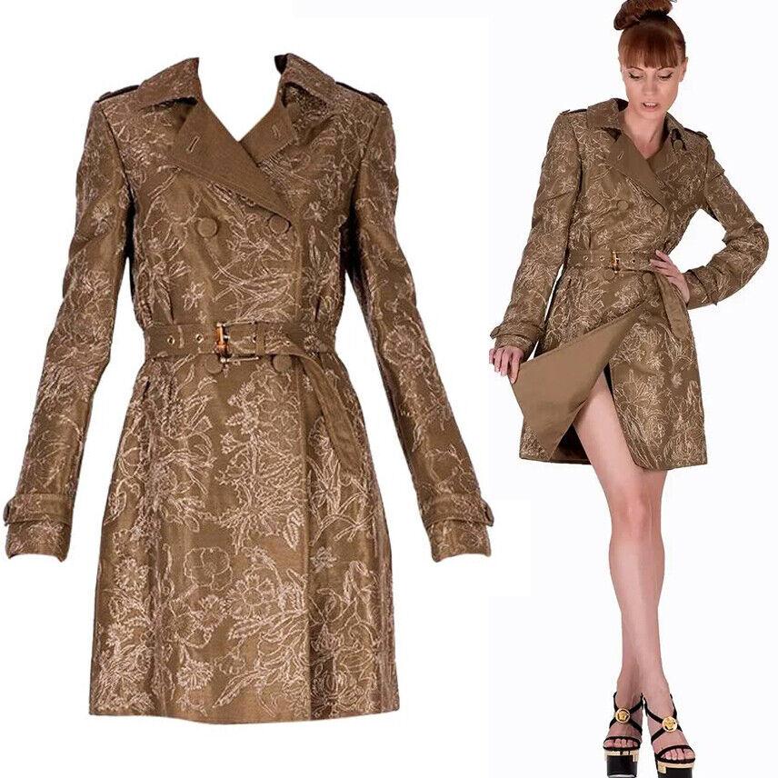 Gucci Limited Edition Embroidered and Beaded Trench Coat
Editor’s note:
Outerwear receives a luxurious makeover courtesy of Gucci. Fashioned in Italy, it features a fitted waist and narrow sleeves. Embroidered with a floral pattern it also showcases