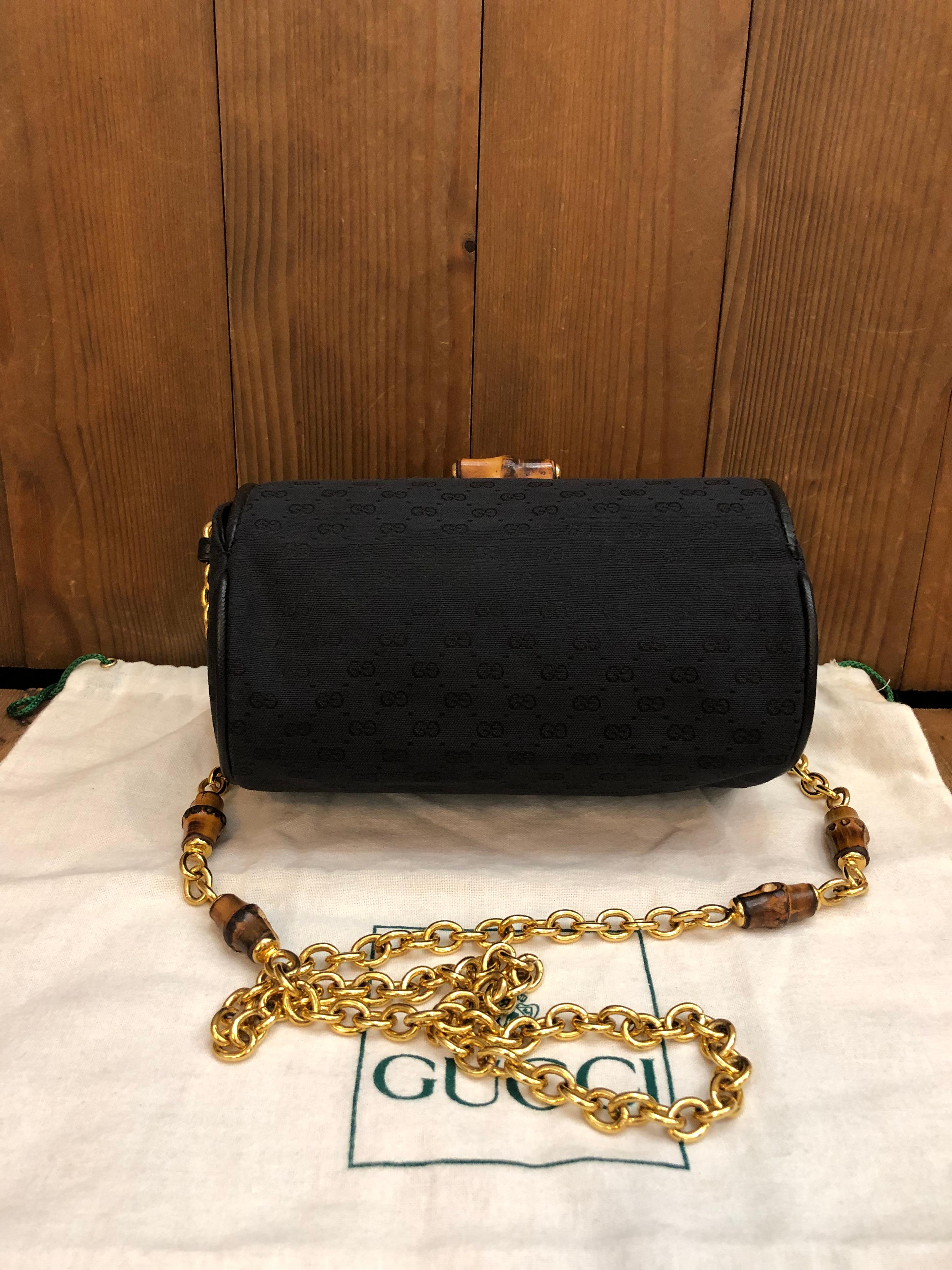 This vintage GUCCI bamboo cylinder chain pouch is crafted of micro GG jacquard in back featuring gold toned chain with bamboo internodes. Front flap bamboo magnetic snap closure opens to coated interior that has been professionally cleaned. Made in