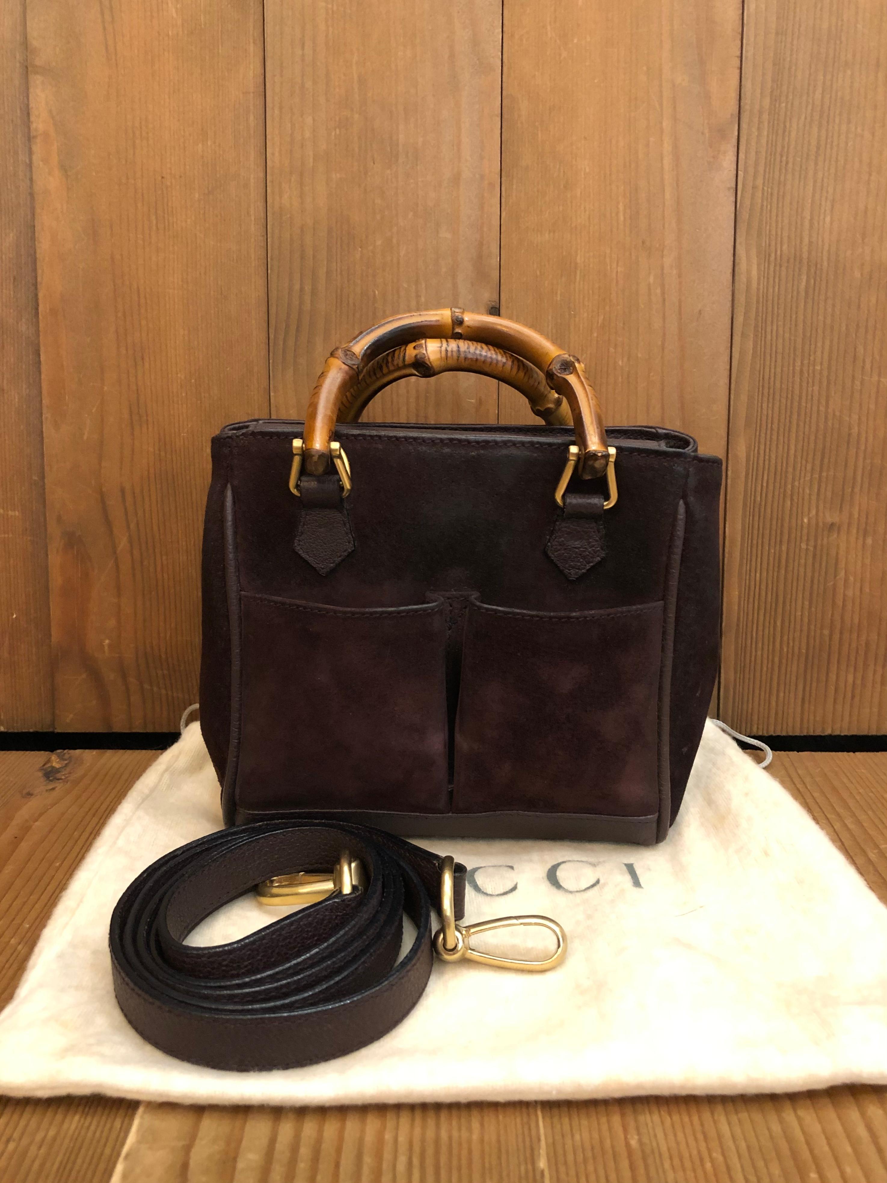 This 1990s vintage GUCCI mini 2-way crossbody bag is crafted of suede and pigskins leather in chocolate brown featuring matt gold toned hardware. The front of this bag features two open pockets. Top magnetic snap closure open to a dark brown