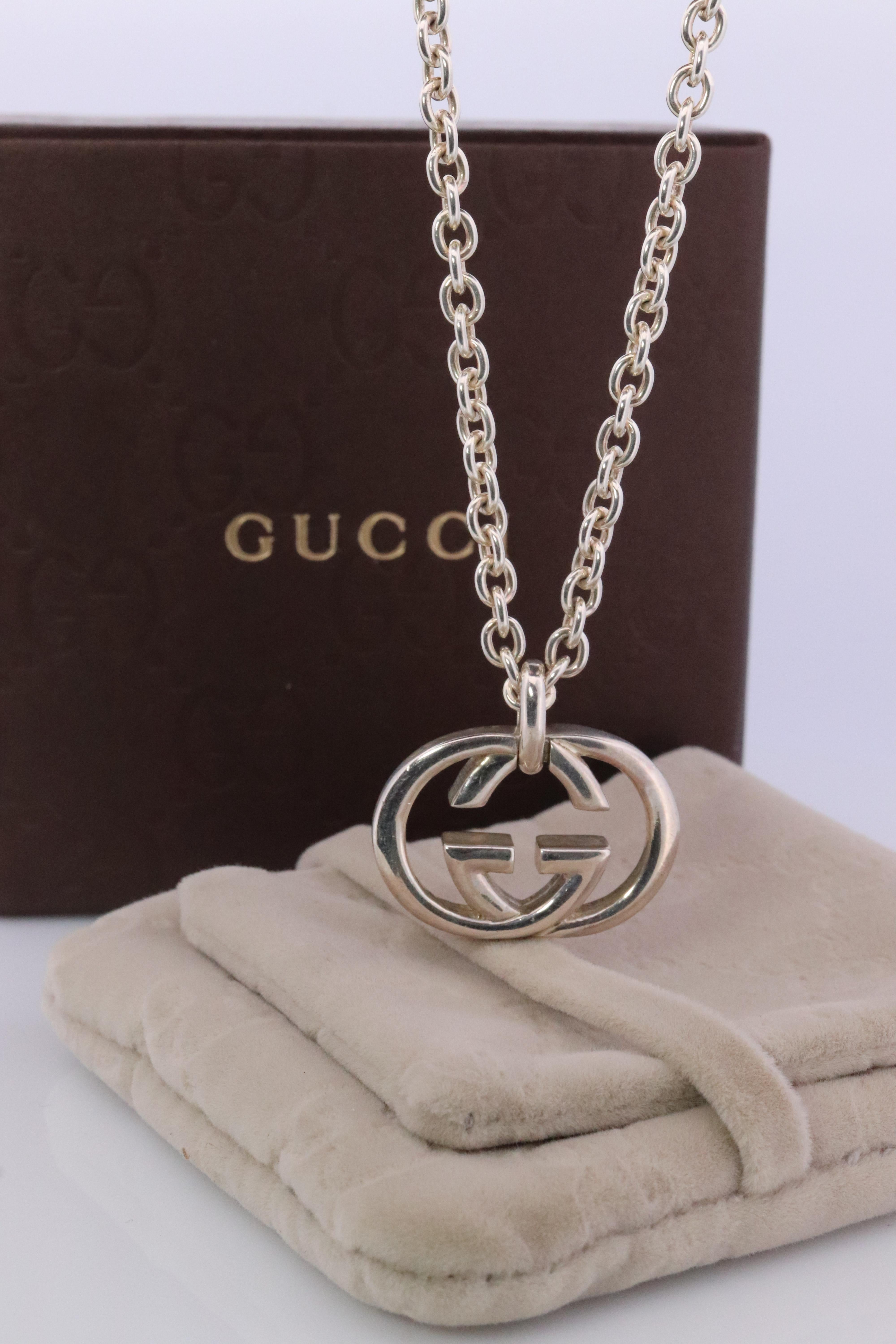 Genuine Gucci Pendant and Necklace

Interlocking Double G Logo Pendant.

Sterling Silver 925

Condition: Comes with original Gucci Box.