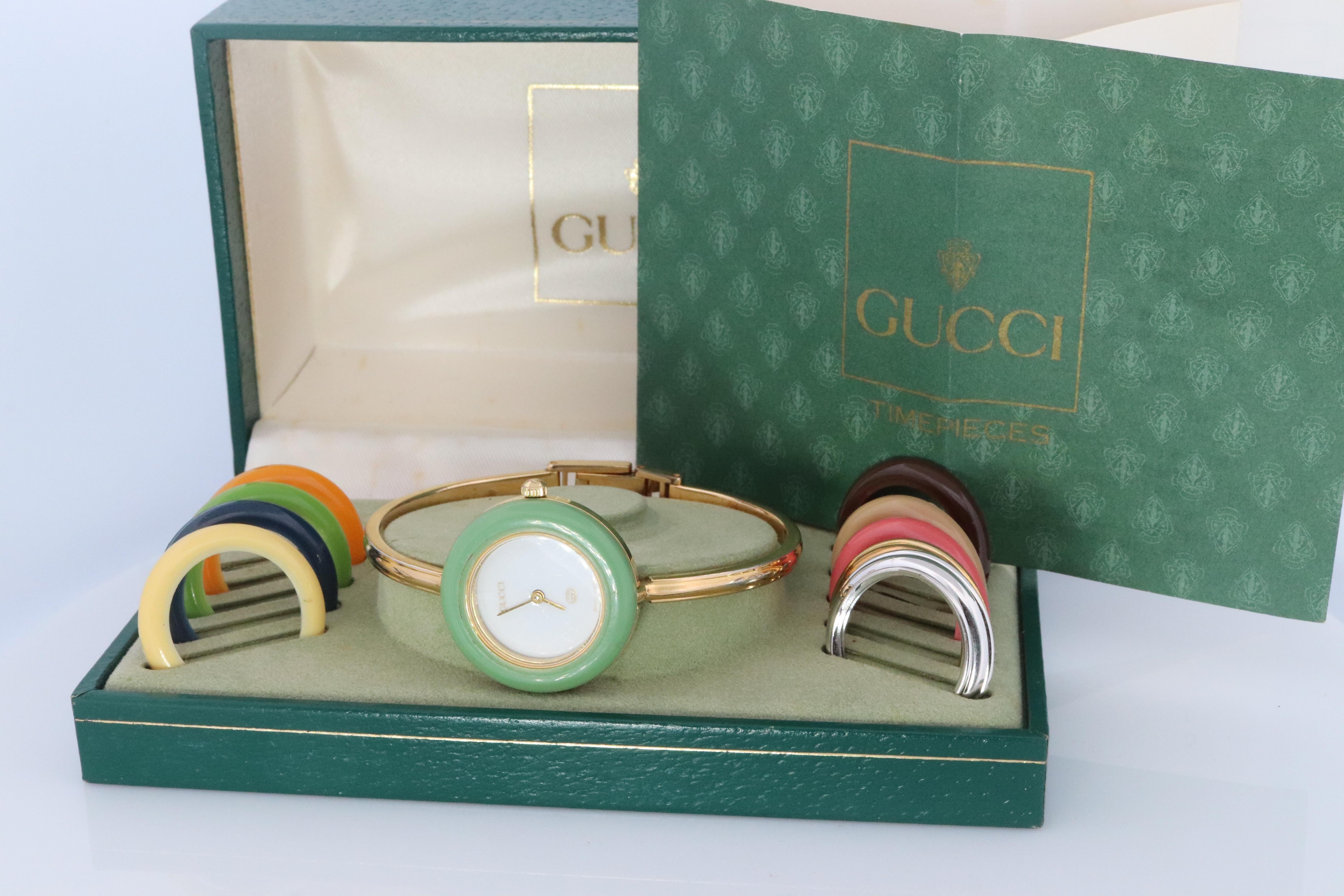 Genuine Gucci Watch.

11/12 Reference number.

Gold Tone with interchangeable bezels.

Original Box with Original Paperwork

Condition: New battery. Comes with original box and original bezels. Please review photos for colors.


Details:
26mm round