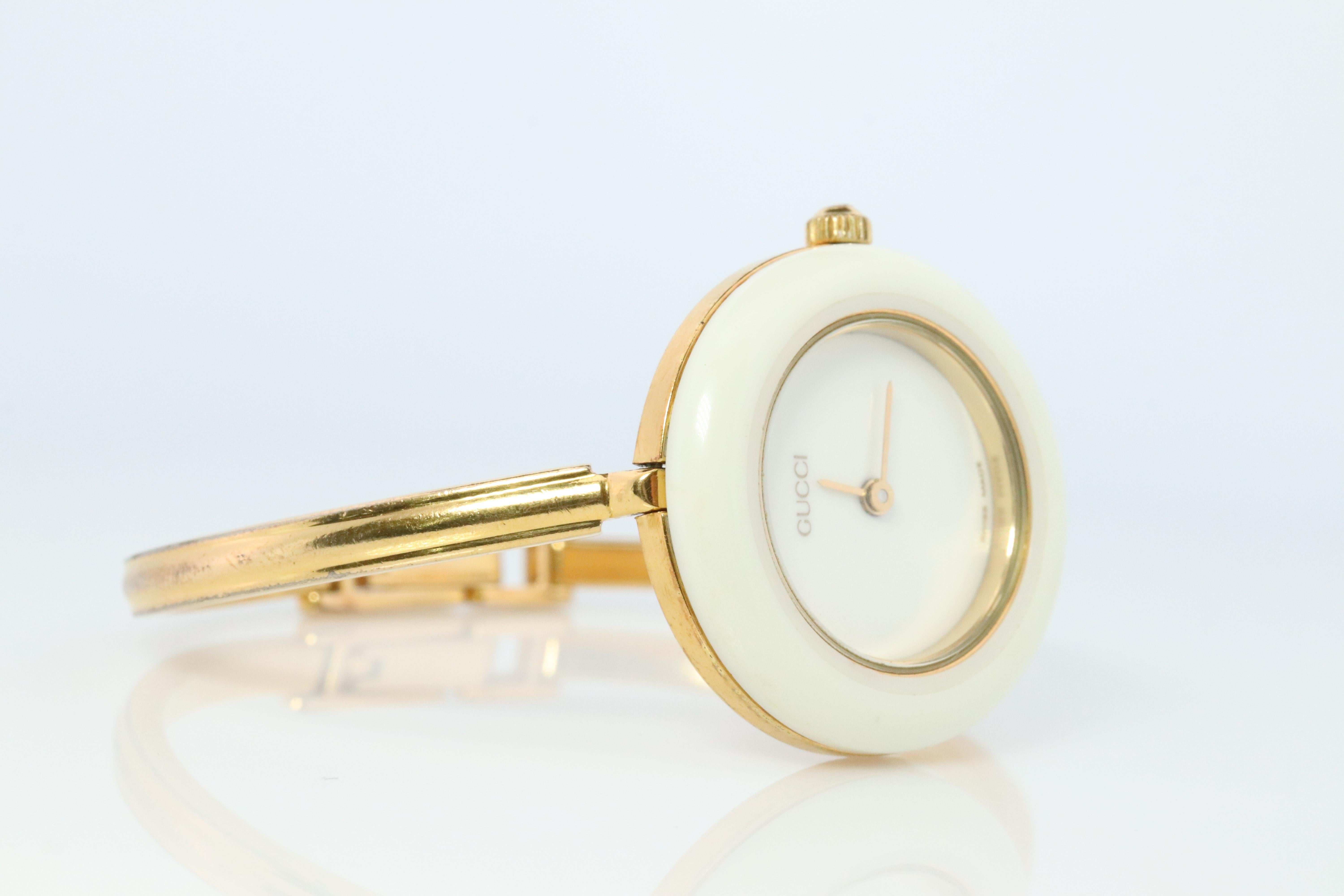 Modern Vintage GUCCI Quartz 11/12.2  Watch. Gucci Ladies Bangle Interchange Bezel watch