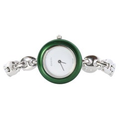 GUCCI Montre vintage à quartz 11/12,2L. Montre-bracelet Gucci pour femmes couleur argent avec lunette