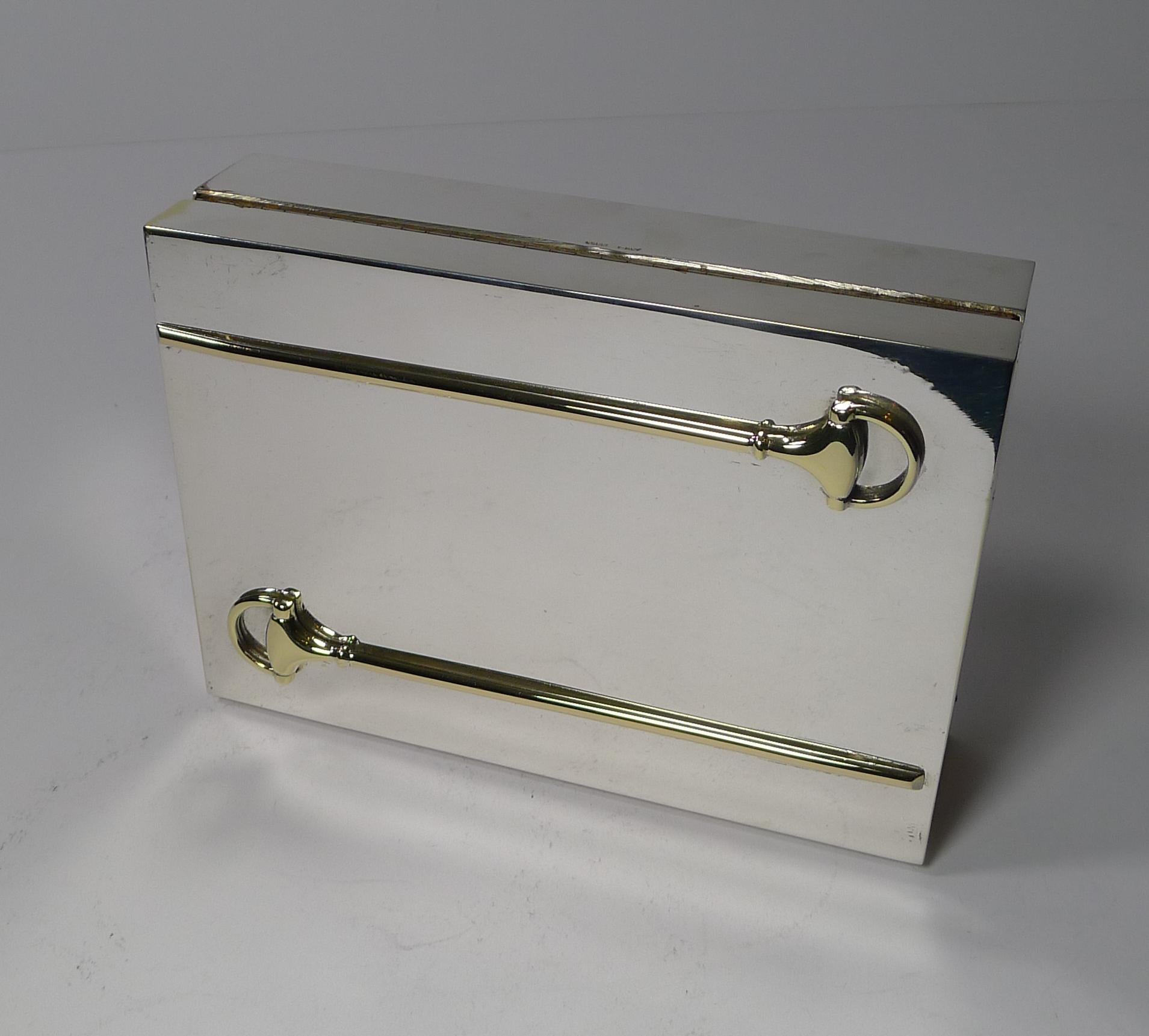 A highly sought-after vintage Gucci box professionally cleaned and polished in our silversmith's workshop, restoring it to its former glory.

The interior retains the original wooden lining and the box is stamped 