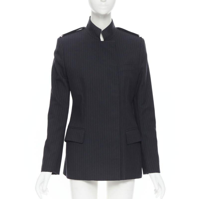 vintage GUCCI TOM FORD 2001 grey pinstripe minimal officer blazer IT42 M
Reference: GIYG/A00051
Brand: Gucci
Designer: Tom Ford
Material: Wool
Color: Grey
Pattern: Striped
Closure: Button
Extra Details: This blazer comes with the complimentary