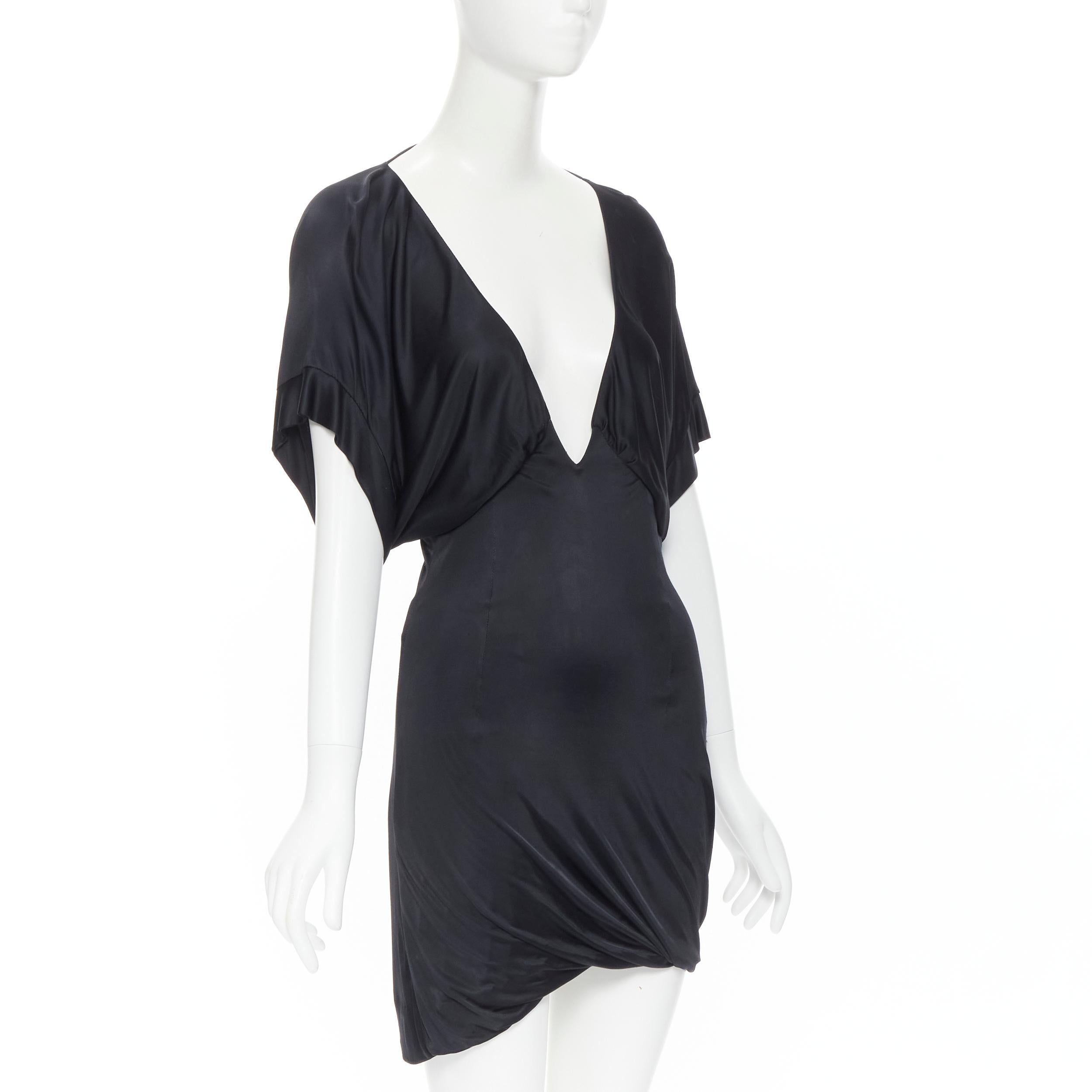 vintage GUCCI TOM FORD 2002 black rayon plunge neck kimono mini dress IT40 S 
Reference: TGAS/B01255 
Brand: Gucci 
Designer: Tom Ford 
Collection: 2002 
Material: Rayon 
Color: Black 
Pattern: Solid 
Extra Detail: Plunge dipped neckline. Draped