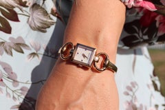 Vintage GUCCI Tornavoni 120 Quartz Wrist Watch. Gucci YA120520 Gold tone Bangle