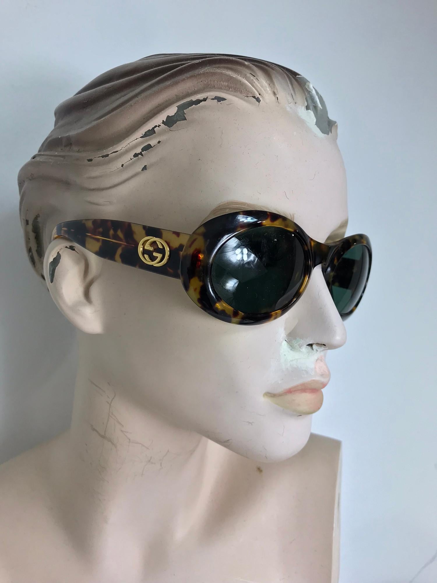 Vintage Gucci tortoise shell sunglasses with the original leather case from the 1970s.
6 1/2 front center side to side
2 high each side
5 side piece
3/4 side high at widest 
 case 7 1/2 long
3 1/2 wide