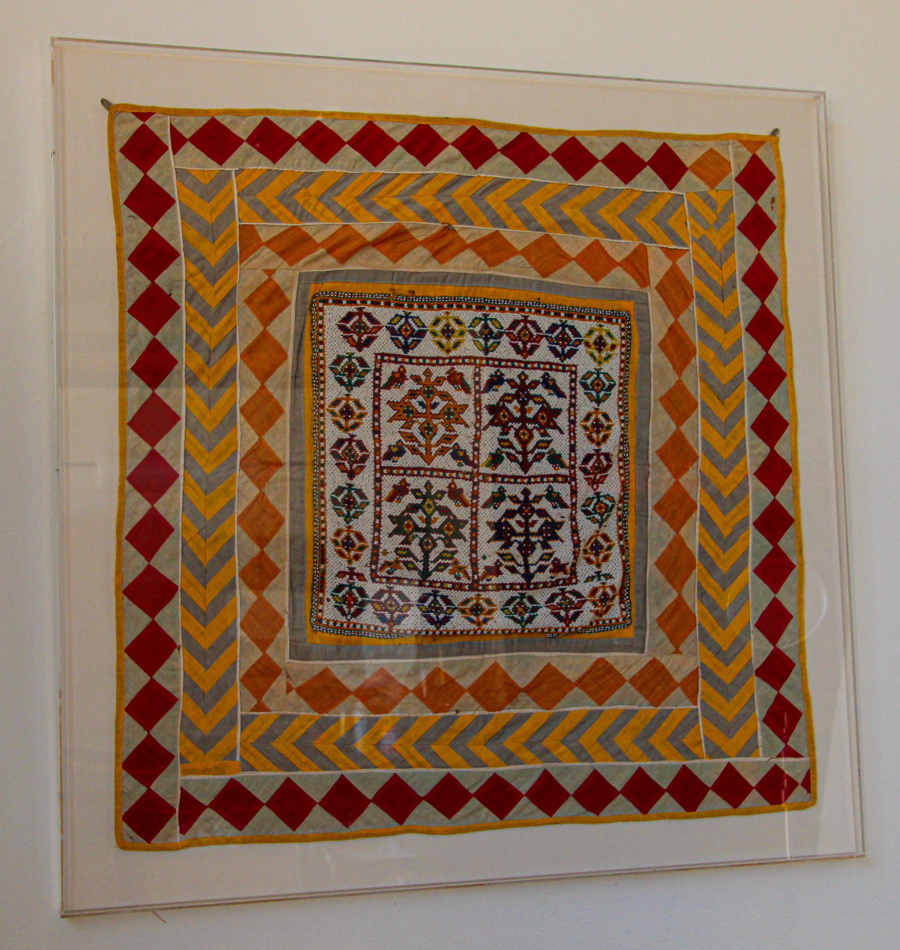 Vintage hand made Gujarat Saurashta Ethnic beadead textile India.
Hand Beaded Guarat Indian panel textile framed in a lucite box.
Amazing work of hand beading by Chakla Indian, Gujarat state, Saurashtra or Kutch region.
Such a nice piece of
