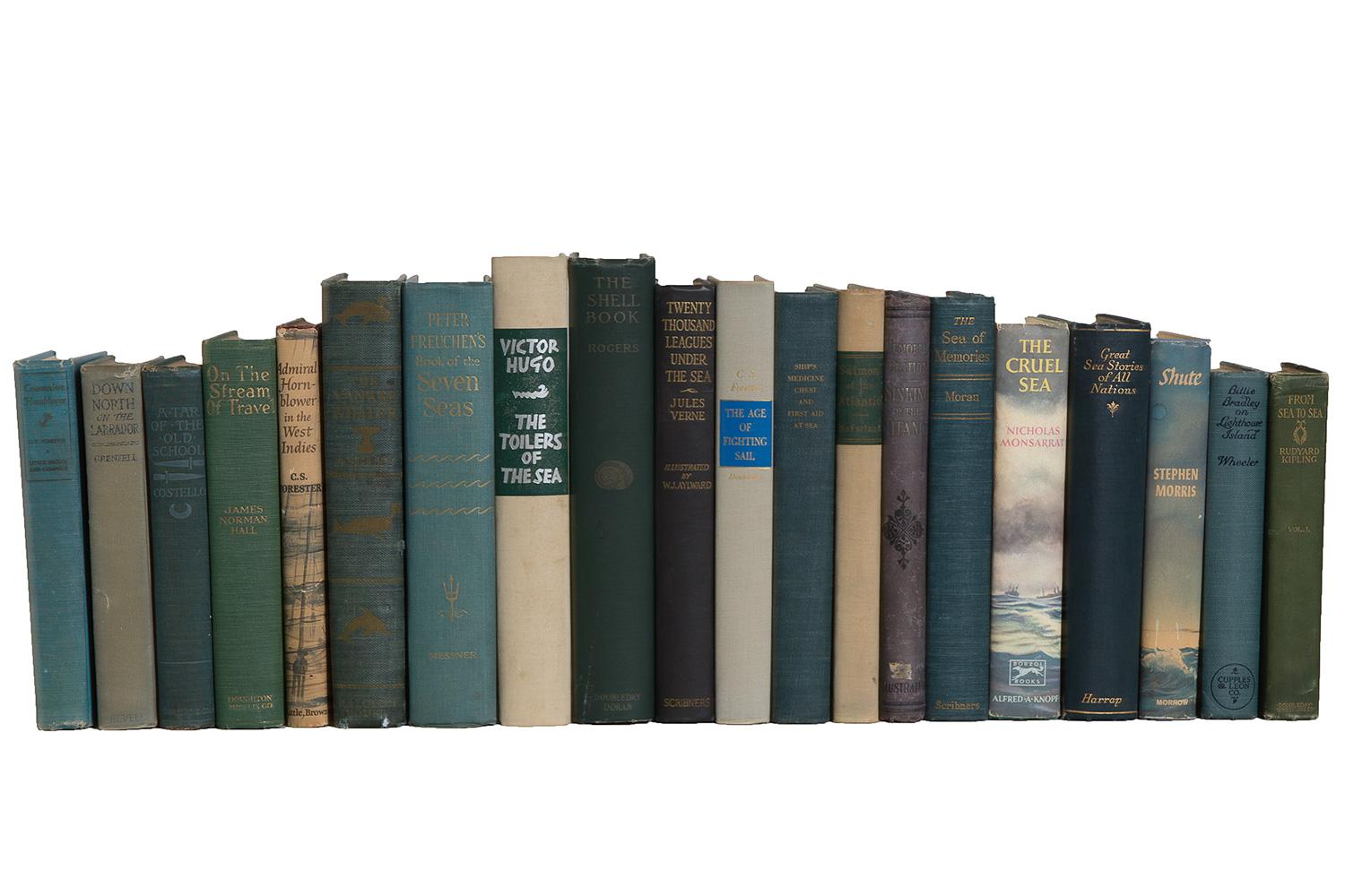 Features a blend of 20 authentic vintage books published 1899-1969. Includes a variety of nautical themed selections in deep teal, green, and tan. Select titles feature works by Kipling, Hugo, Verne, and more with several in original dust jackets.