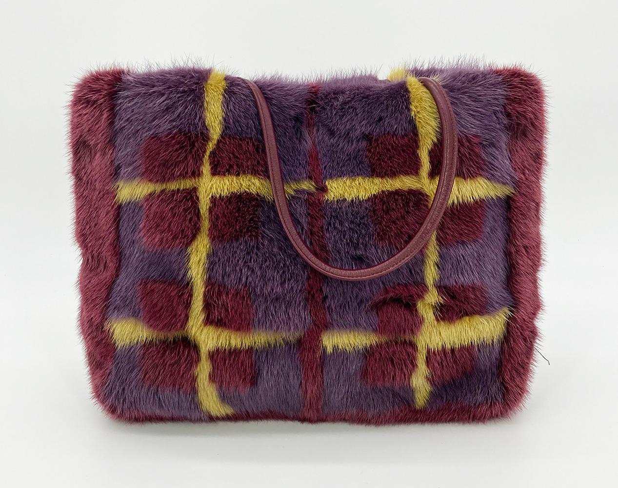 Vintage Guliana Teso Maroon Plaid Prink Mink Fur Handbag in excellent condition. Maroon mink exterior with yellow and purple plaid print. Double top maroon leather handles. Top magnetic snap closure opens to a black nylon branded interior with one