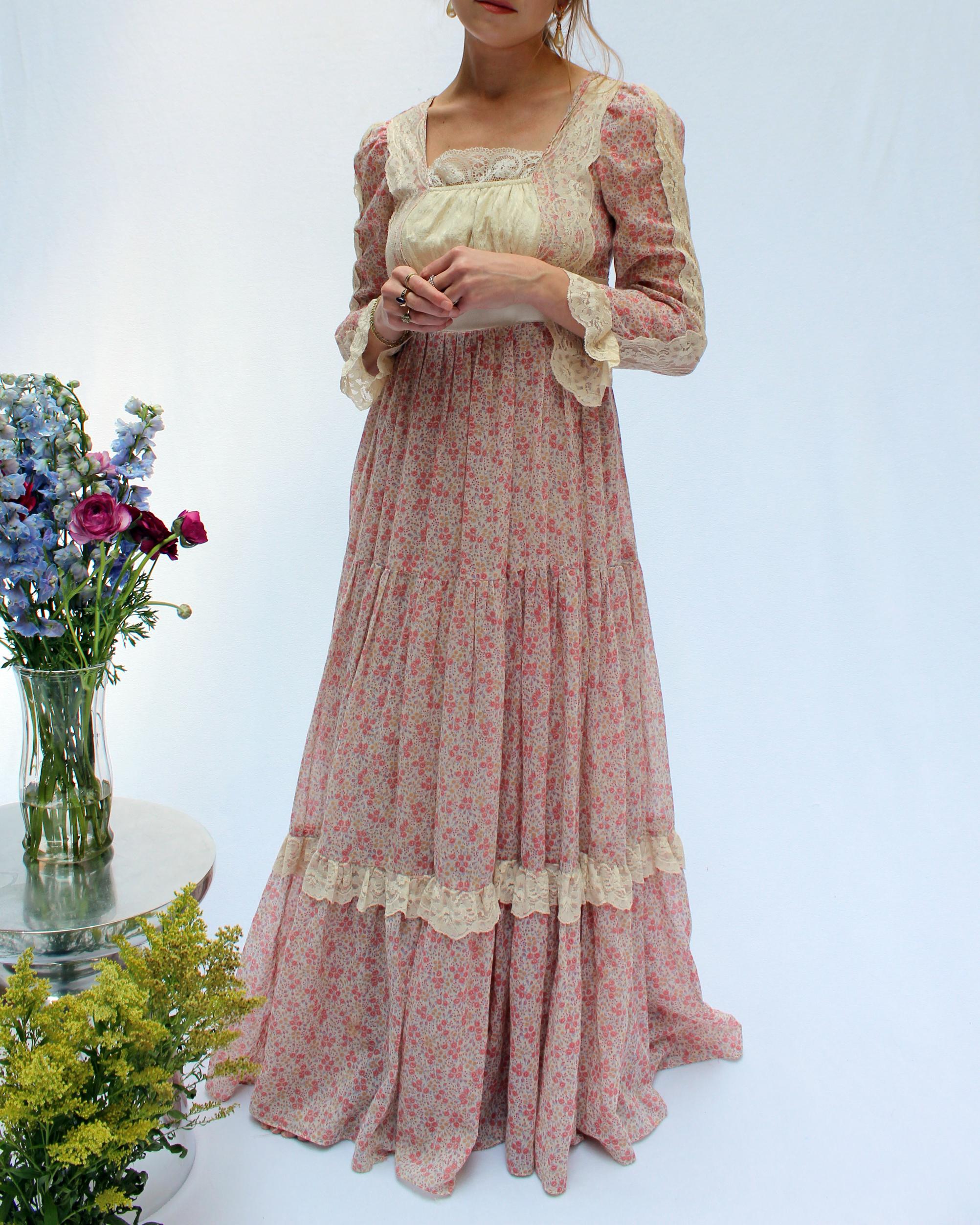 This vintage 1970s Gunne Sax dress is a romantic dream. In the 1970s, Gunne Sax borrowed heavily from Victorian silhouettes, igniting an entire aesthetic that went on to define the style of an era. This dress is a beautiful example: its crafted from