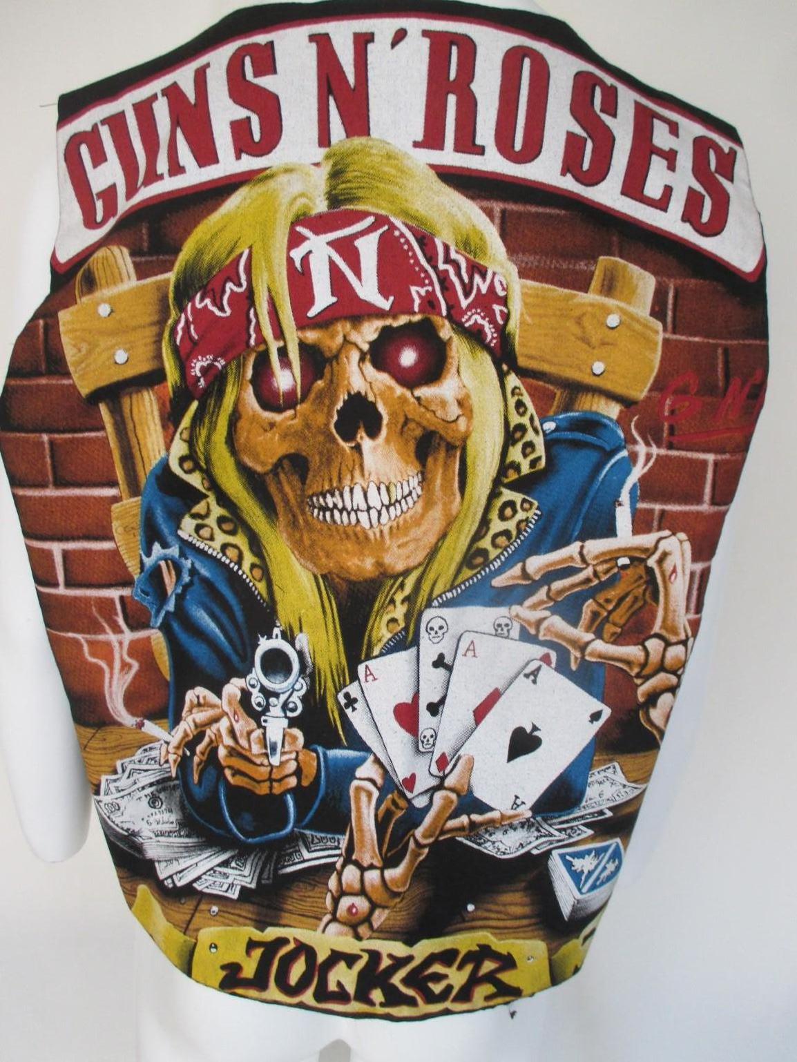 --Collectors-item--  Guns & Roses vintage
 This is an amazing and very rare piece of collection for Guns n roses fans from the early 90's with the front and back fully printed.
The vest has 4 buttons
Color black
Its in good vintage condition 
It can