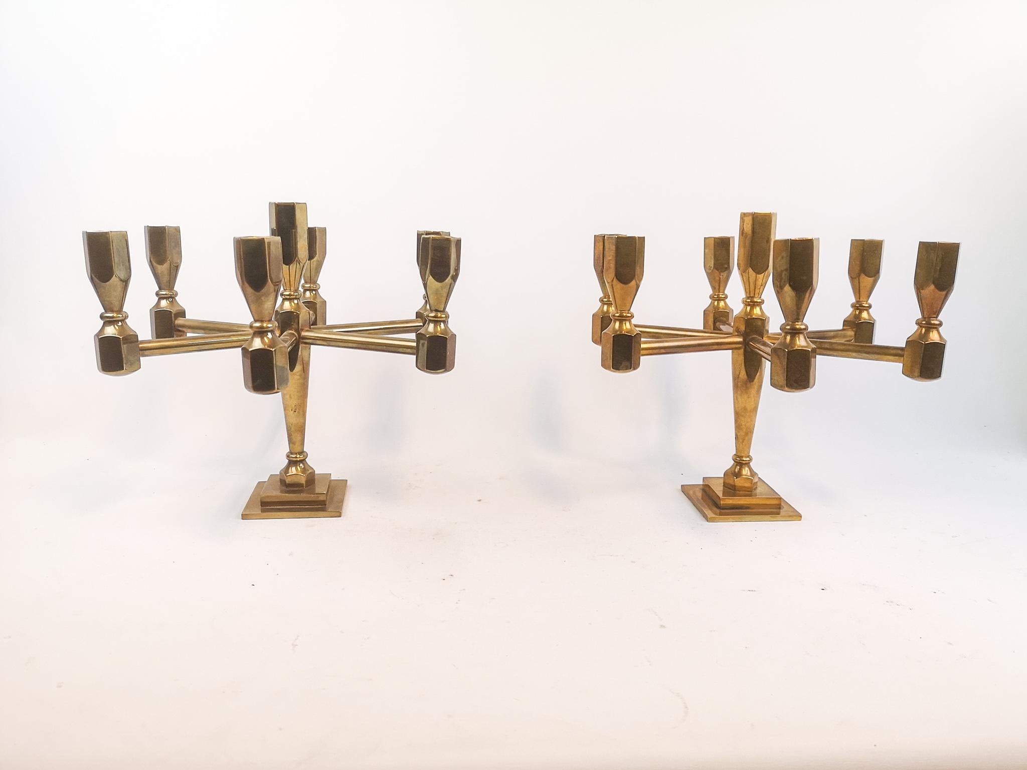 Pair of large and heavy Gusum brass table chandelier for seven candles. Wonderful in solid brass is this Candelabra made in Sweden in the 1970s. In good condition and it is singed in the bottom of the candelabra

Measures: 27 cm. x 27 cm.