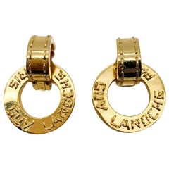 Guy Laroche Boucles d'oreilles vintage jour et nuit avec logo des années 1980