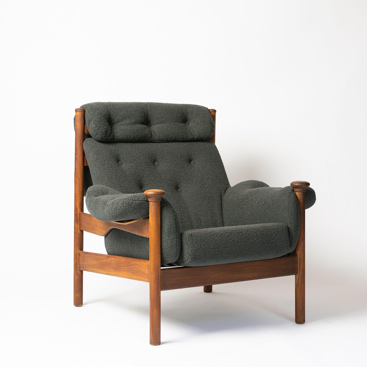 Mid century lounge chair 
 
Design by Eric Pamphilon and George Fejer for Guy Rogers. 
 
Solid teak frames, newly upholstered in grey bouclé fabric. 
 
Extremely comfortable, like having a hug from a big teddy bear!
 
In excellent vintage
