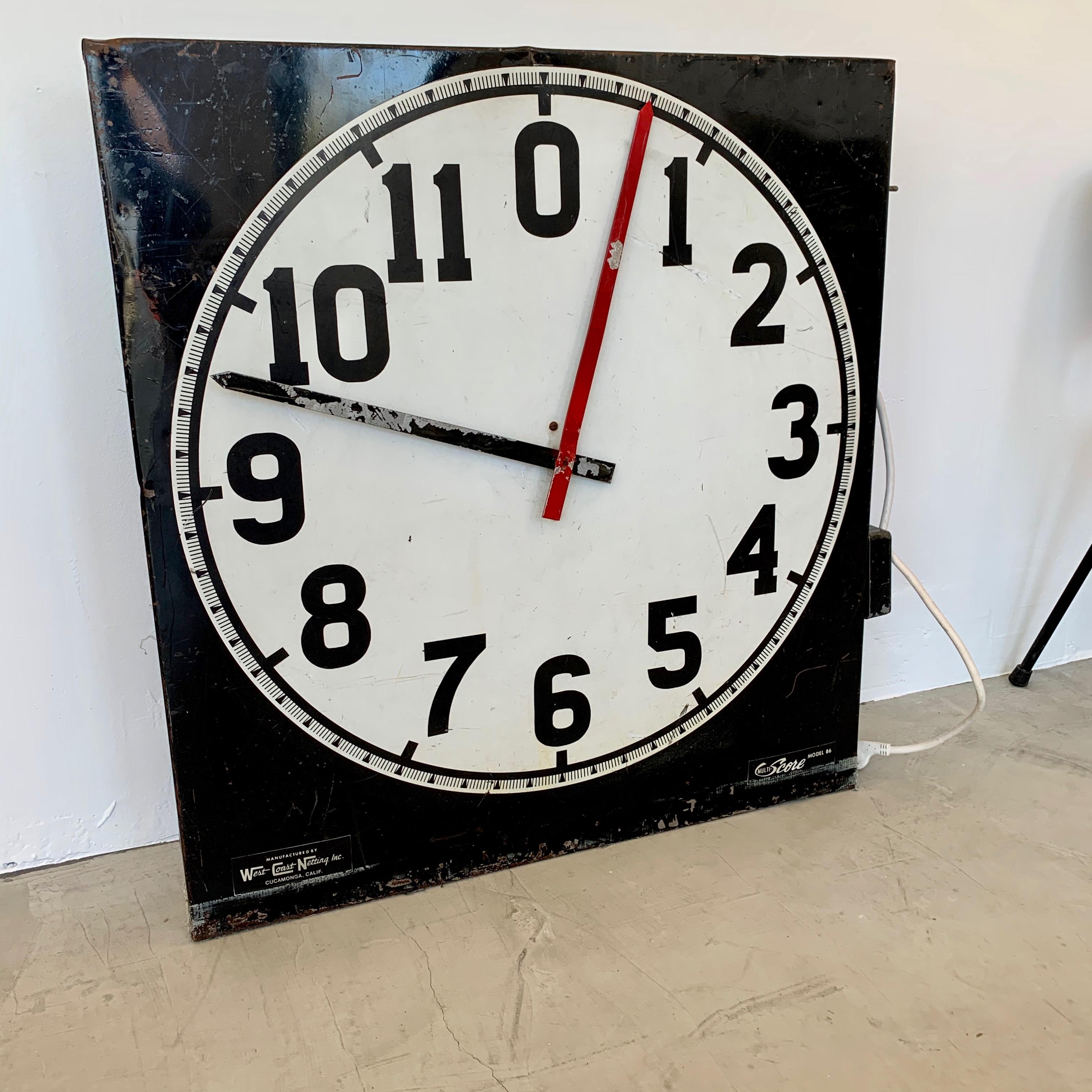 Interesting clock taken down from a gymnasium here in Southern California. Clock can run forwards or backwards. Very loud, working horn, operated by a hand switch. Would look great hanging on the wall or placed on the floor. Large scale. Measures: