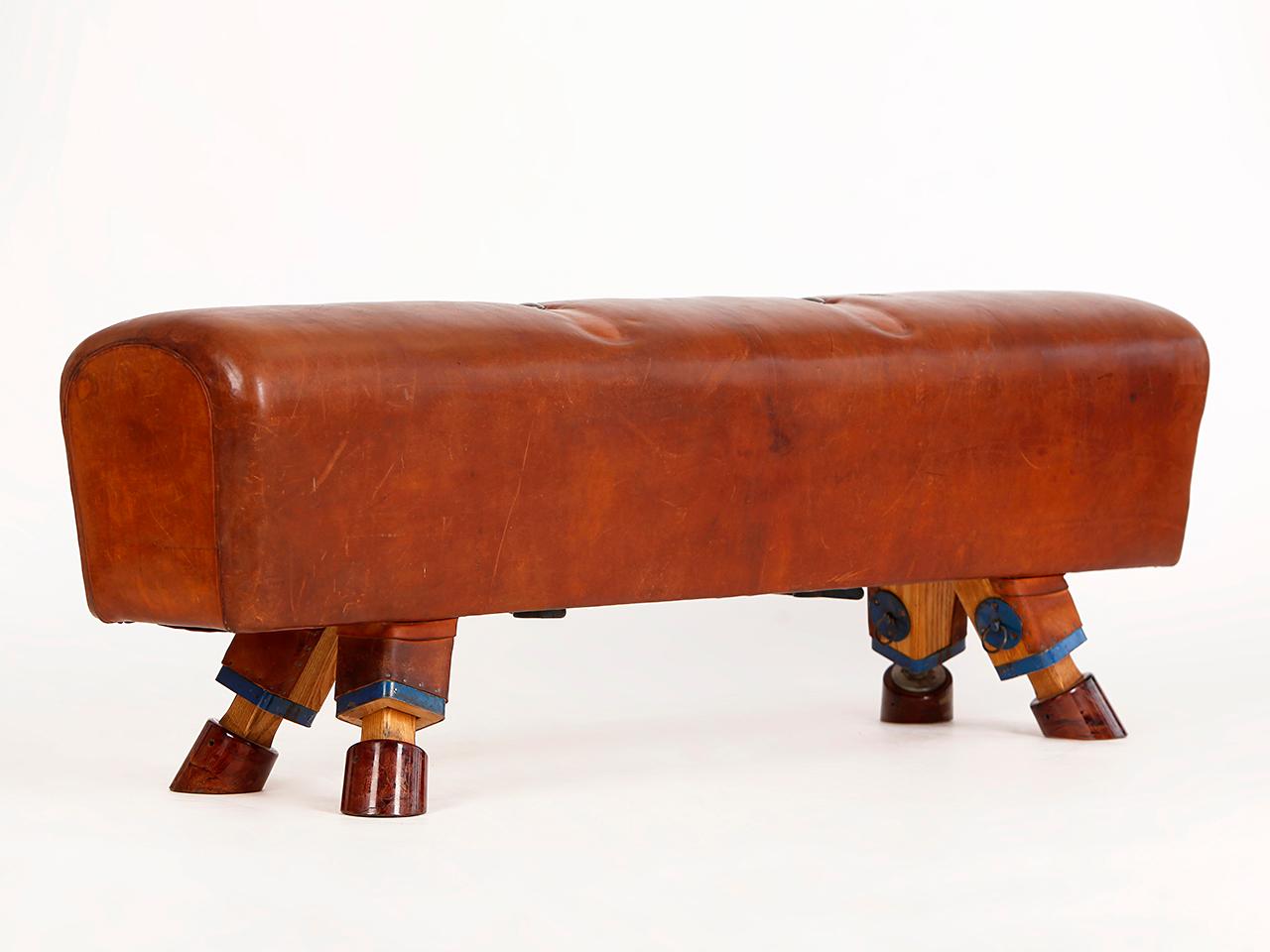 Pommel horse from former Czechoslovakia. The legs were cut to a height of 54cm.
The thick leather has been cleaned and the patina was retained. Very good vintage condition.