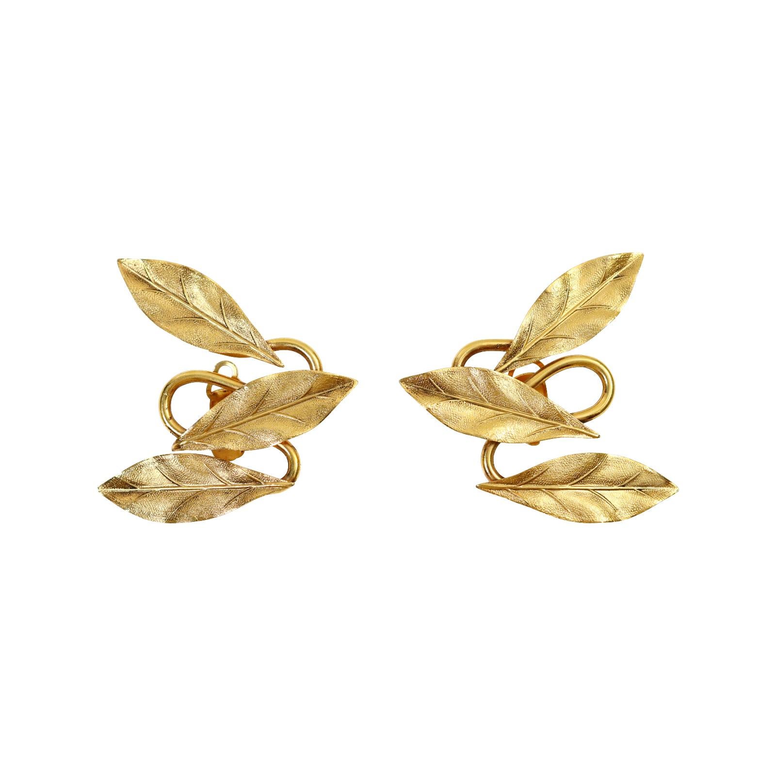 Vintage Gynuki Torimaru  Gold Tone Earrings Circa 1980s.  These are one of the most gorgeous pair of earrings I have in the collection.  They have ear appeal, not curb appeal.  They are 3 leaves that are together that when applied to the ear are
