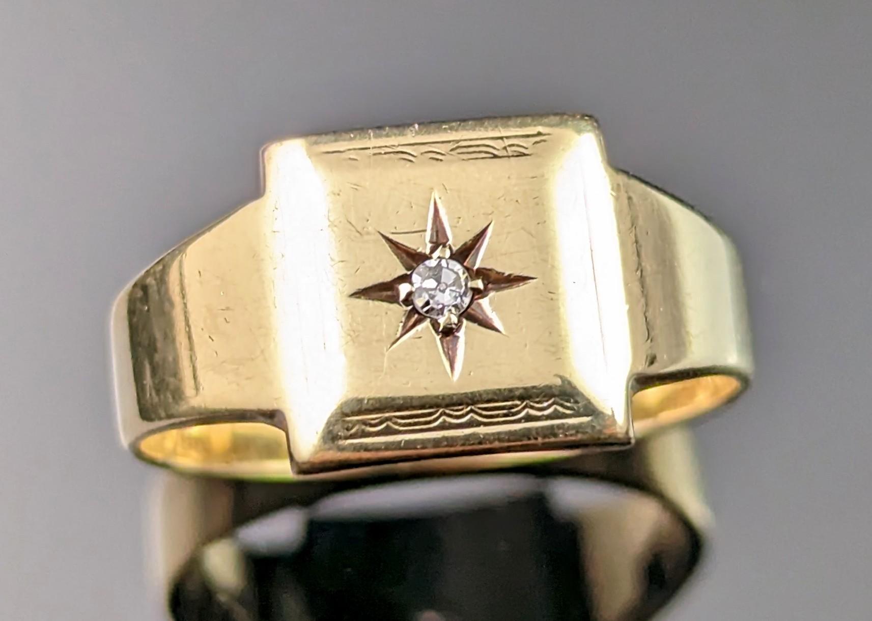 This vintage Art Deco era 9ct yellow gold Diamond signet ring is simply lush!

The perfect pinky ring rich yellow gold with a squared face and a central star set white diamond approx 0.10ct.

The face has a lightly engraved border but some of this